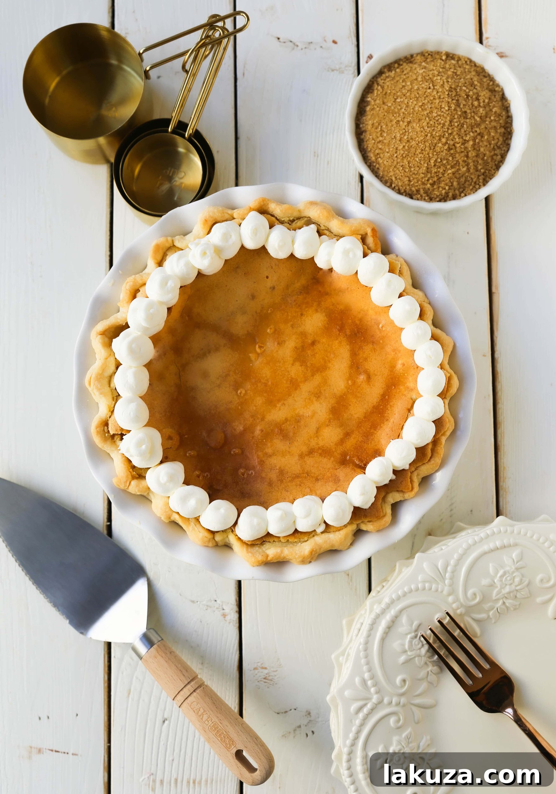 Crisp Caramel Custard Pie 3 Creme Brûlée Pie. A silky smooth vanilla custard in a buttery crust topped with a crisp sugar topping. It is a creamy sweet pie with a touch of tang and will be everyone's favorite pie! www.modernhoney.com #thanksgiving #pie #pies #thanksgivingrecipes #cremebrulee
