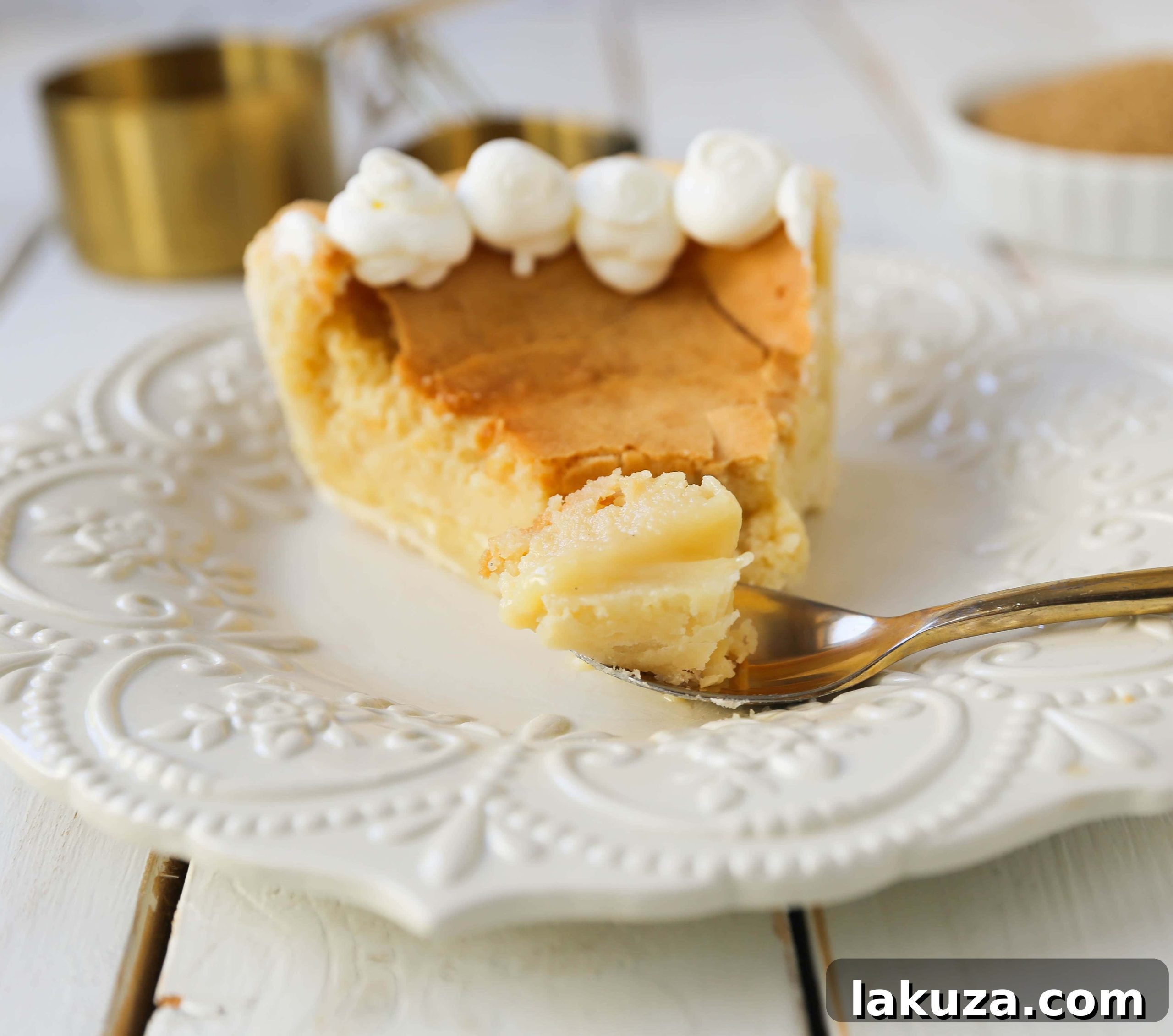 Crisp Caramel Custard Pie 4 Creme Brûlée Pie. A silky smooth vanilla custard in a buttery crust topped with a crisp sugar topping. It is a creamy sweet pie with a touch of tang and will be everyone's favorite pie! www.modernhoney.com #thanksgiving #pie #pies #thanksgivingrecipes #cremebrulee