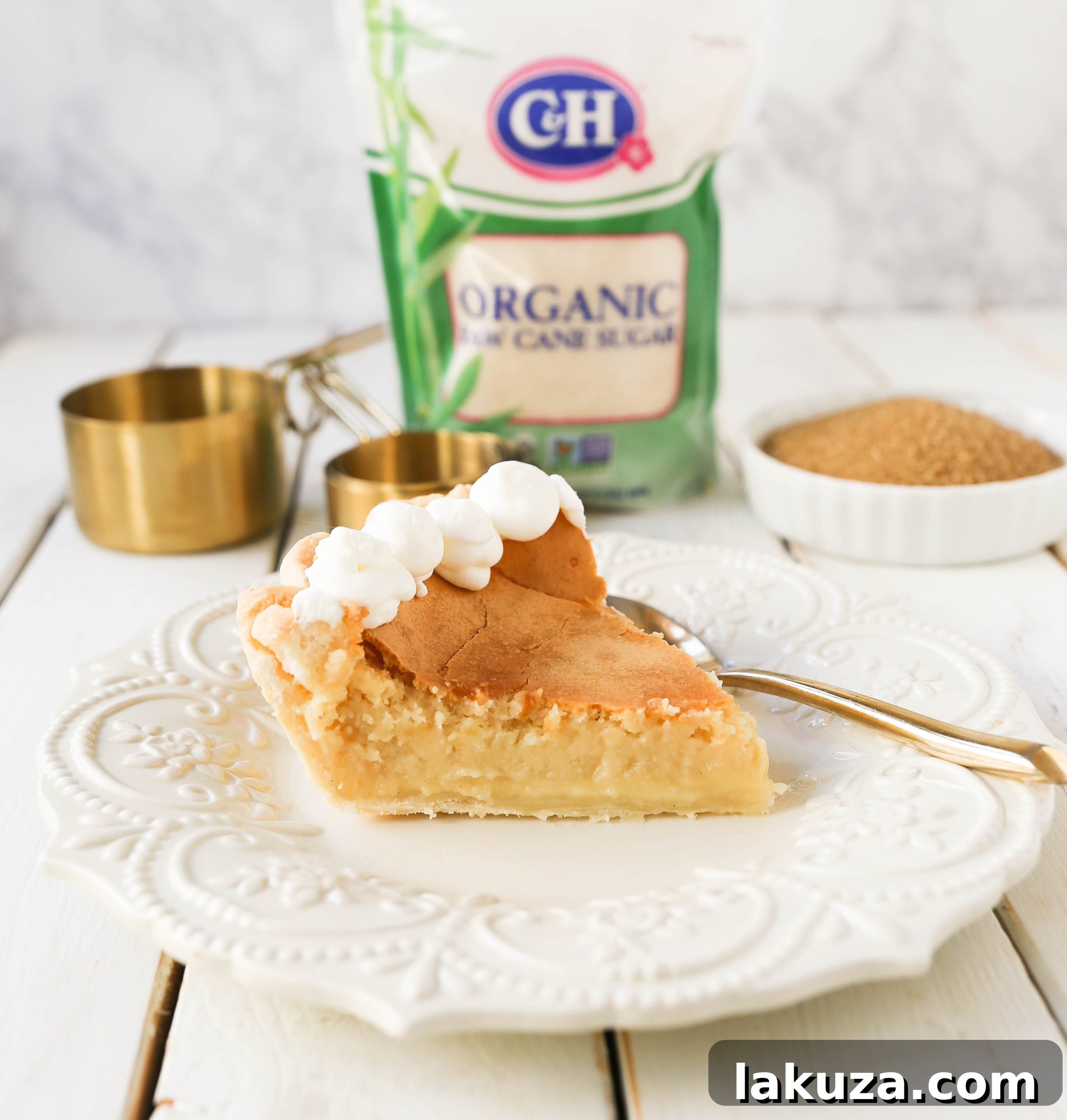 Crisp Caramel Custard Pie 6 Creme Brûlée Pie. A silky smooth vanilla custard in a buttery crust topped with a crisp sugar topping. It is a creamy sweet pie with a touch of tang and will be everyone's favorite pie! www.modernhoney.com #thanksgiving #pie #pies #thanksgivingrecipes #cremebrulee