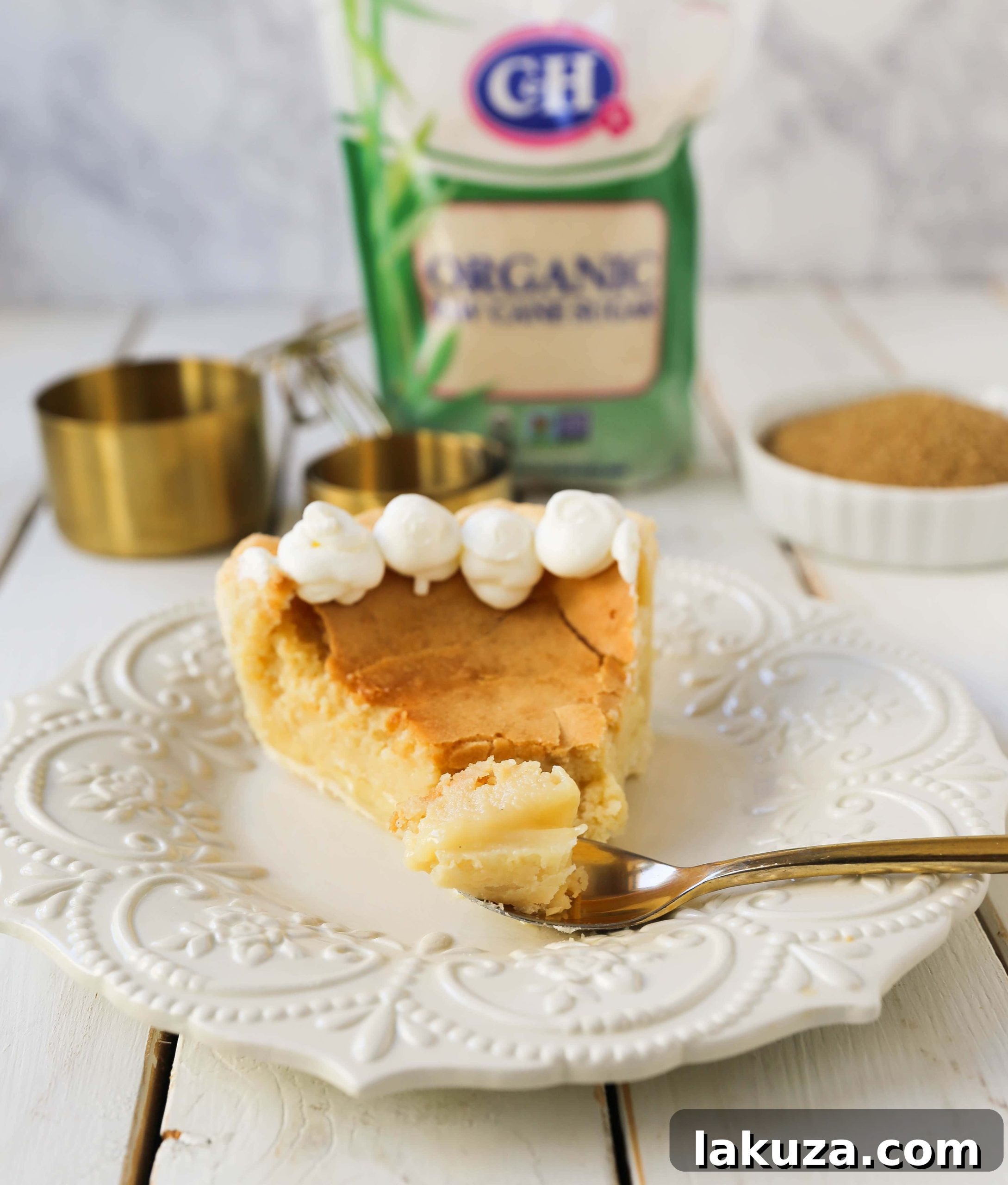 Crisp Caramel Custard Pie 7 Creme Brûlée Pie. A silky smooth vanilla custard in a buttery crust topped with a crisp sugar topping. It is a creamy sweet pie with a touch of tang and will be everyone's favorite pie! www.modernhoney.com #thanksgiving #pie #pies #thanksgivingrecipes #cremebrulee
