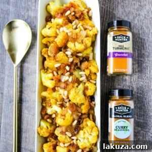 Turmeric Roasted Cauliflower Indian spiced roasted cauliflower with warm spices, caramelized onions, sweet golden raisins, and crunchy pine nuts. A flavorful, healthy side dish perfect for any occasion!