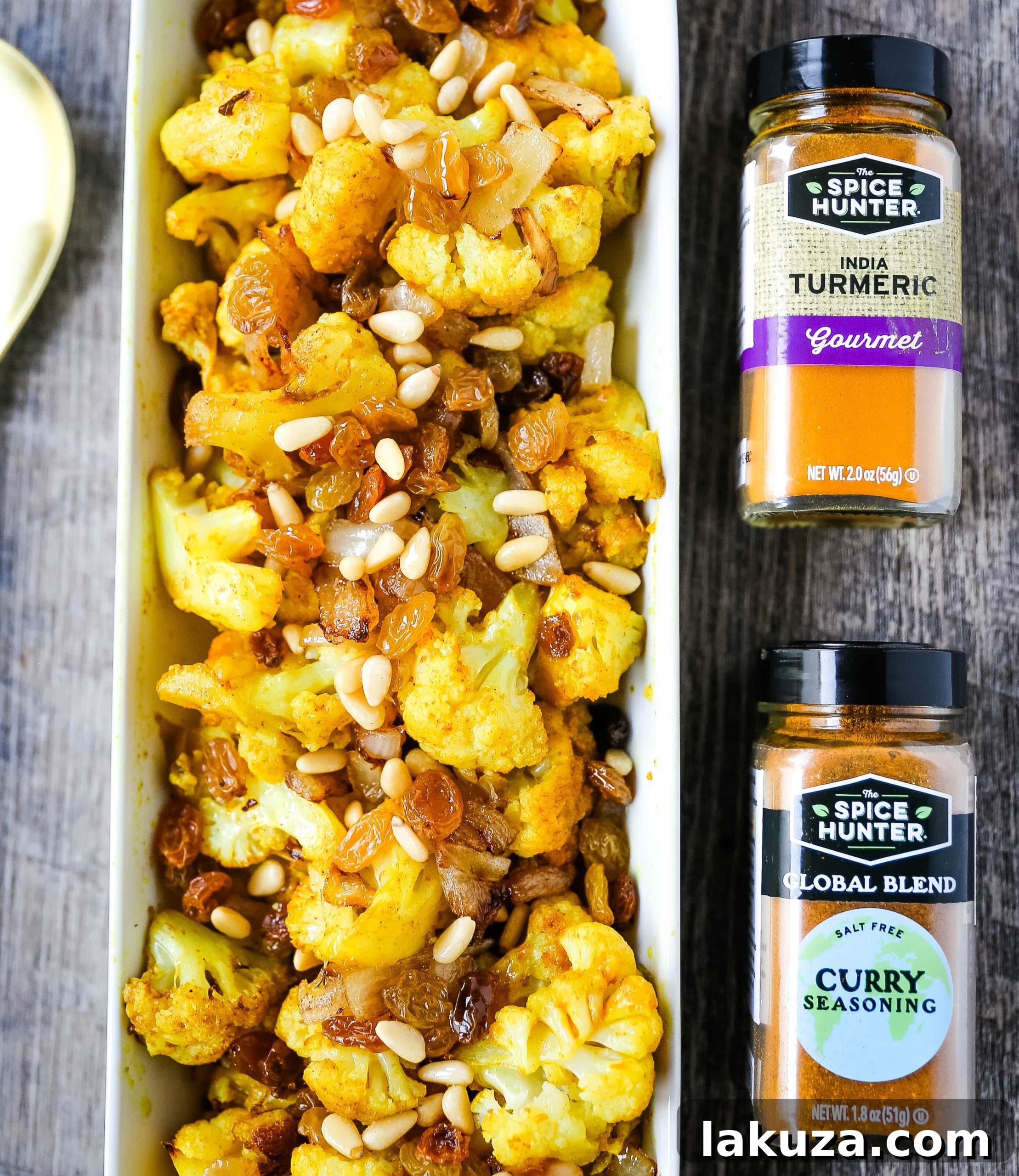 Healthy Roasted Cauliflower florets spiced with turmeric and curry powder.