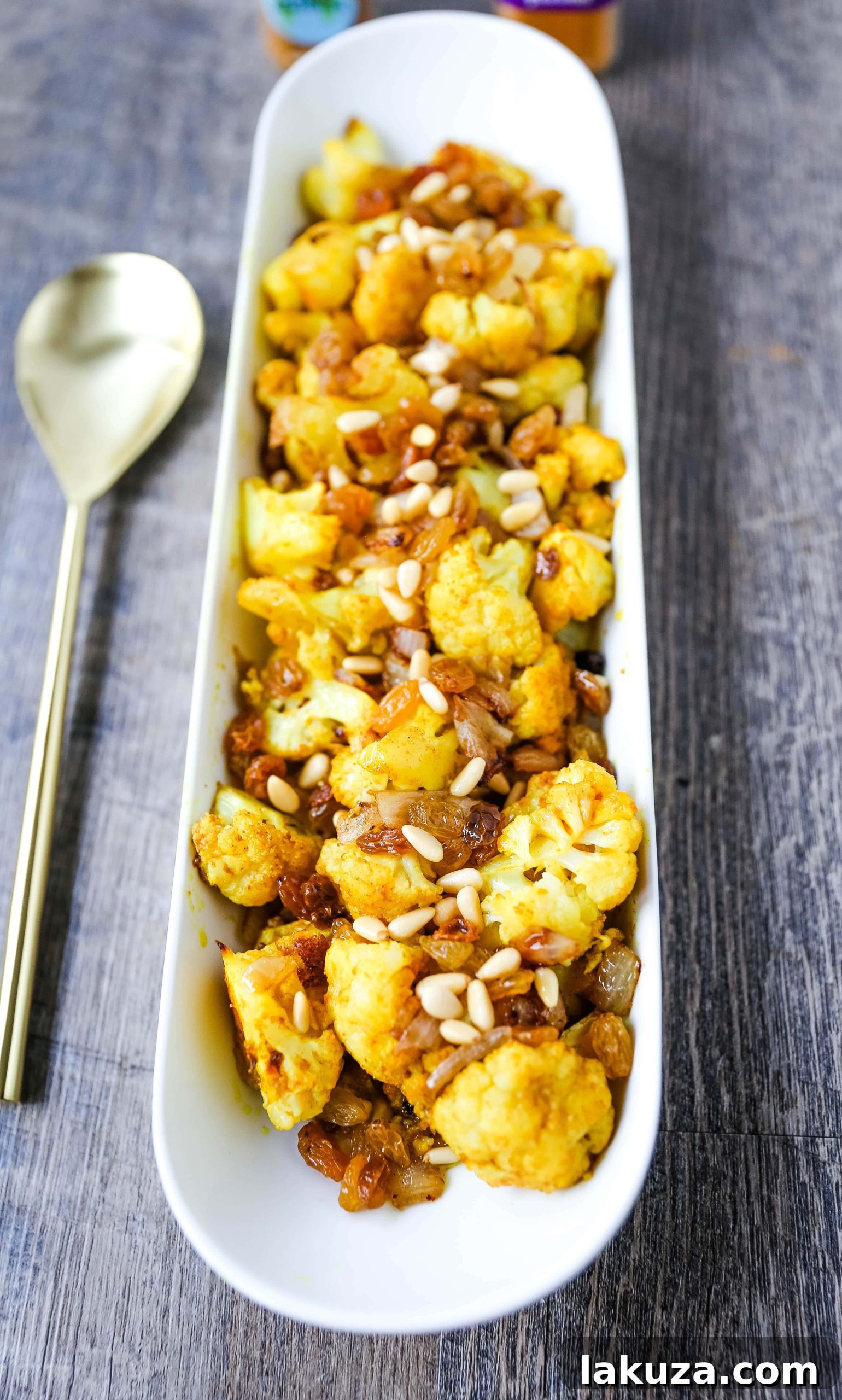 Freshly roasted turmeric cauliflower tossed with sweet golden raisins and crunchy pine nuts.