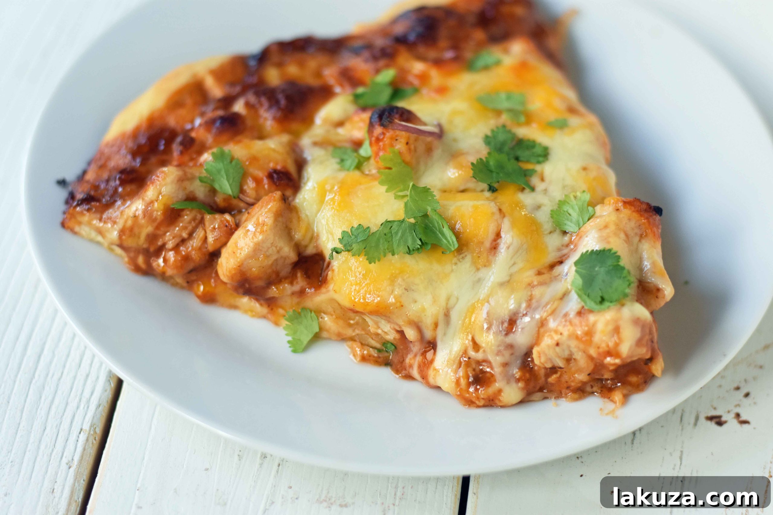 Gourmet BBQ Chicken Pizza at Home 12 A vibrant, close-up image of a full Homemade BBQ Chicken Pizza, featuring all its delicious ingredients.