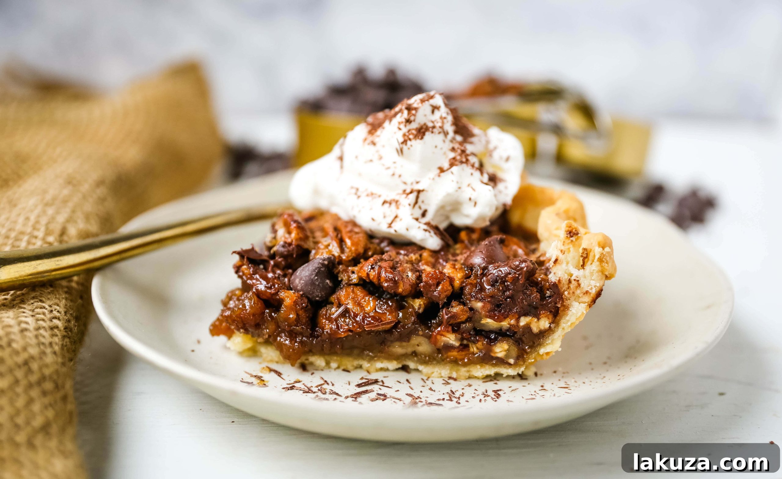 Chocolate Pecan Pie sliced, revealing the rich filling and crust