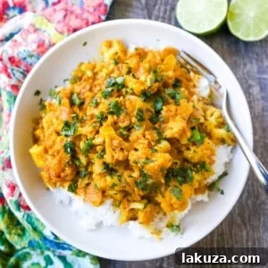 Coconut Cauliflower Curry - A rich coconut curry broth with onion, garlic, cauliflower, ginger, Indian spices in coconut milk.