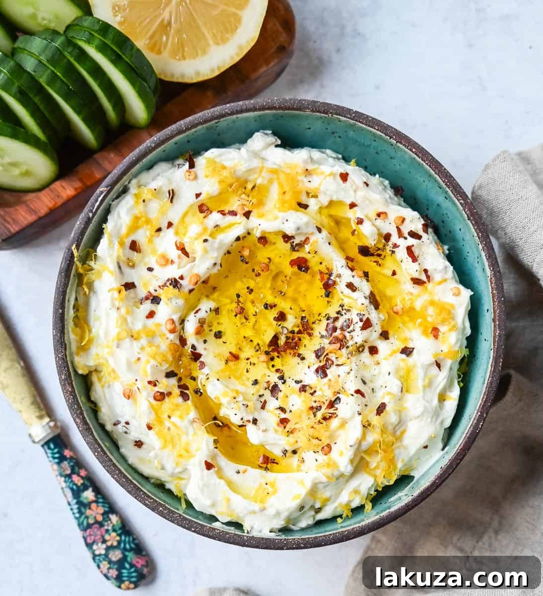 Simple and creamy whipped feta cheese dip is the perfect appetizer! Mediterranean feta cheese is whipped with cream cheese, olive oil, lemon zest, and warm spices. Fresh and tangy, it pairs perfectly with pita bread and veggies!