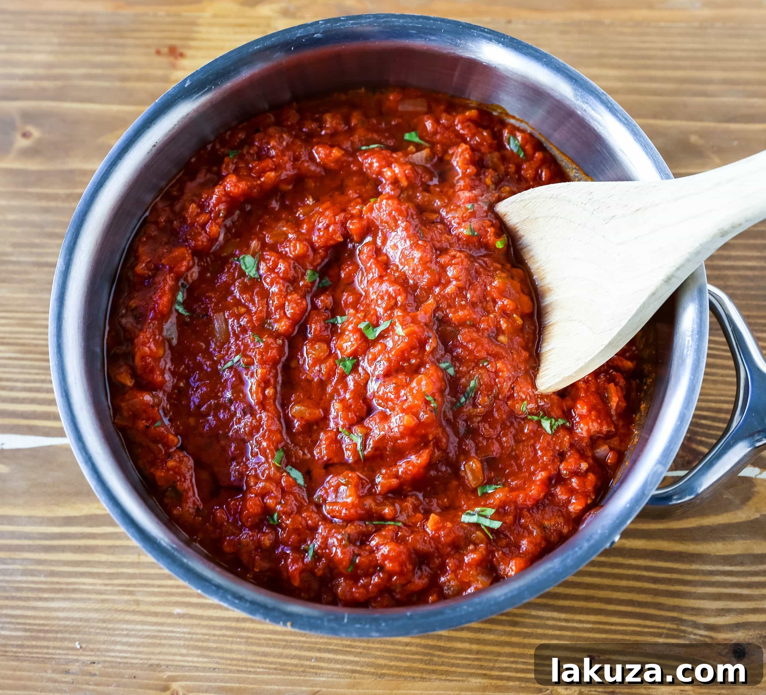 Grandma's Secret Tomato Recipe 2 Classic Italian Marinara Sauce: A homemade, robust tomato sauce with San Marzano tomatoes, fresh basil, sweet carrot, and garlic, perfect for pasta.