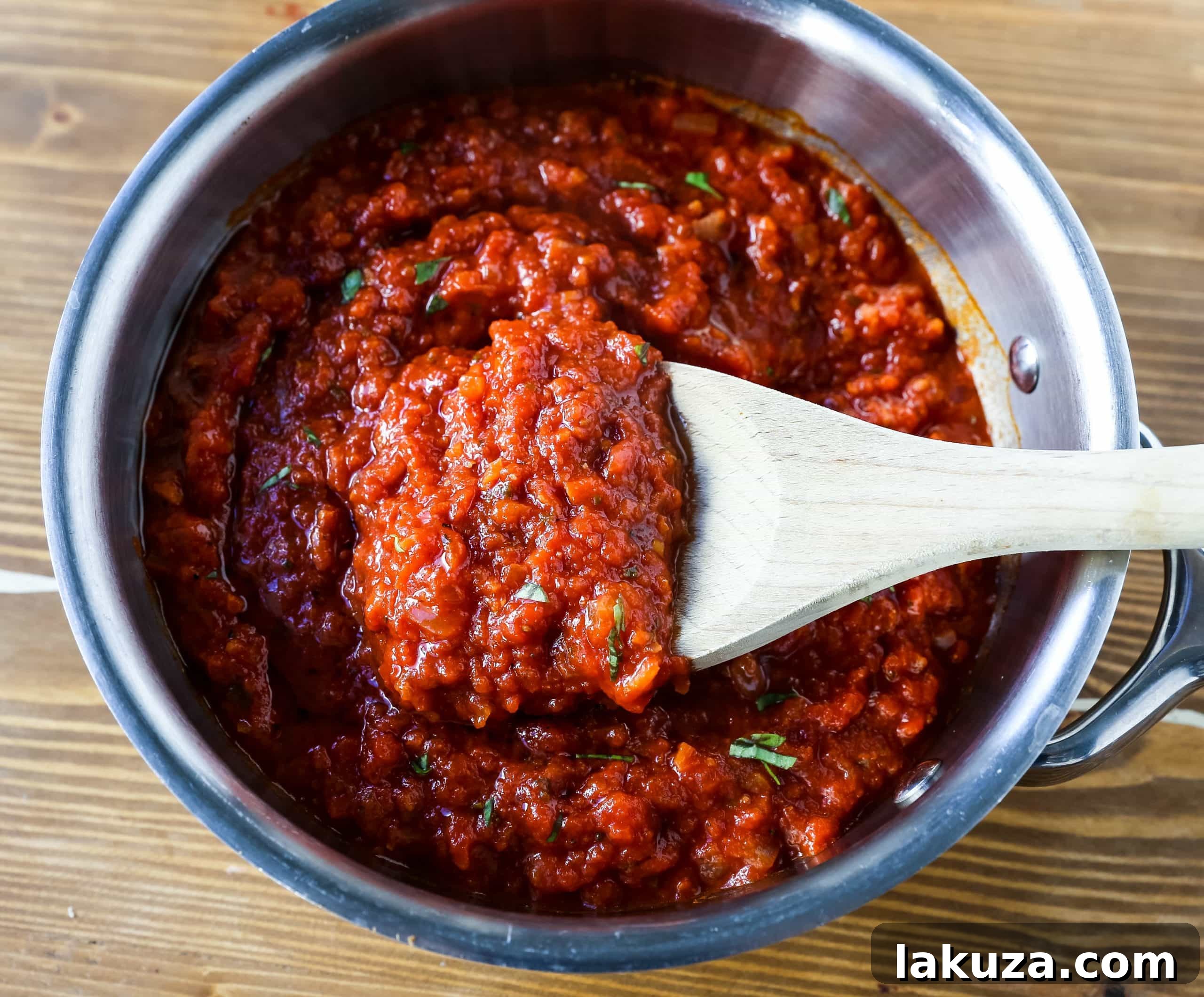 Grandma's Secret Tomato Recipe 5 A simmering pot of robust Italian tomato sauce, garnished with fresh basil leaves, ready to be served with your favorite pasta.