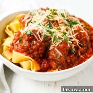 Set It and Forget It Meatballs 6 Slow Cooker Meatballs. Tender, moist homemade meatballs made with ground beef, sausage, parmesan cheese, bread crumbs, and spices. Slow cooking the meatballs make the most melt-in-your-mouth meatball! www.modernhoney.com #meatball #meatballs #italian #italianfood #pasta