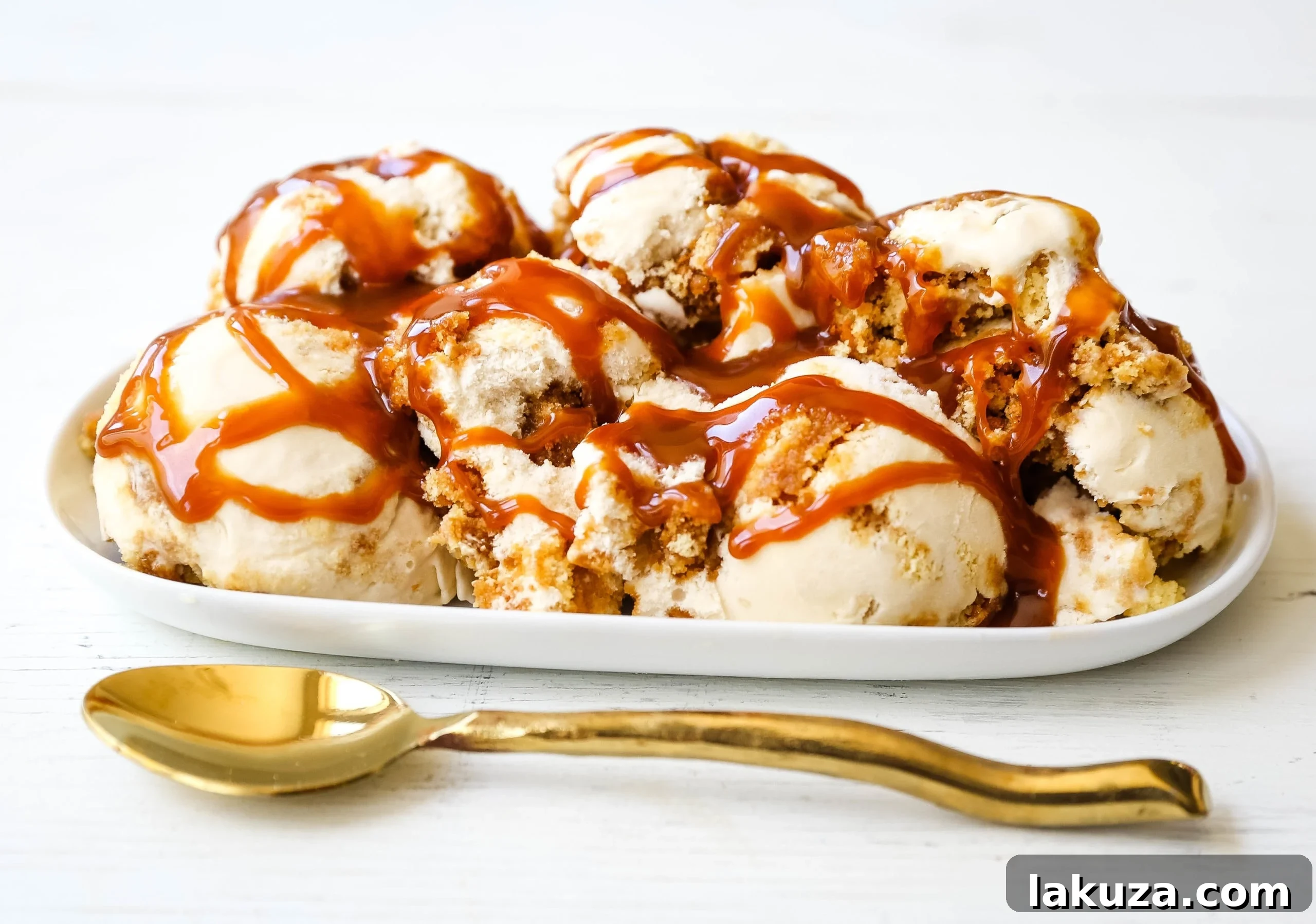 Decadent Caramel Gooey Butter Cake Ice Cream 2 Rich and creamy homemade Caramel Gooey Butter Cake Ice Cream, featuring tender chunks of butter cake soaked in sweet caramel and decadent caramel swirls. A perfect summer dessert.