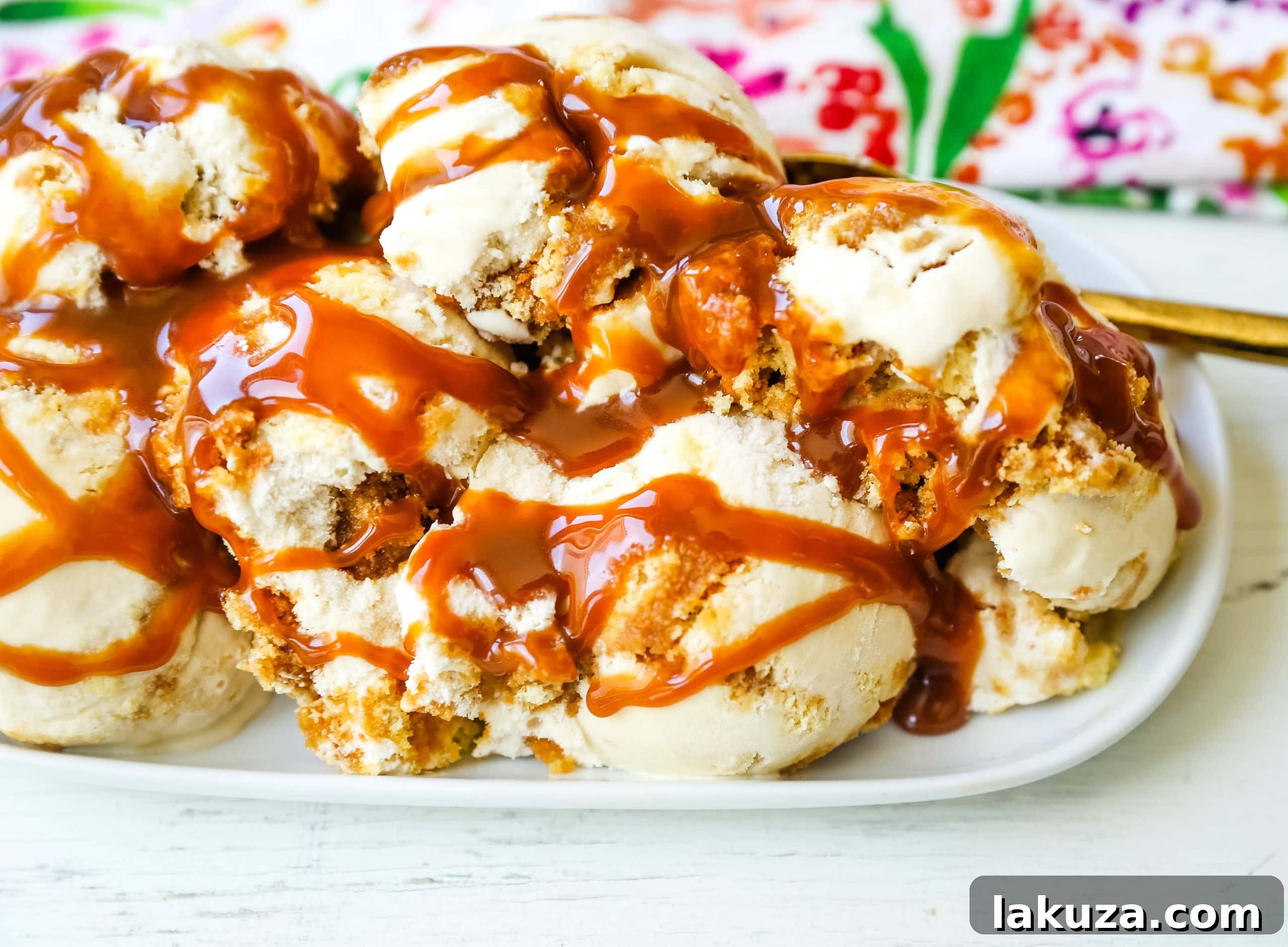 Decadent Caramel Gooey Butter Cake Ice Cream 4 Overhead shot of freshly churned Caramel Gooey Butter Cake Ice Cream with visible cake pieces and caramel streaks.