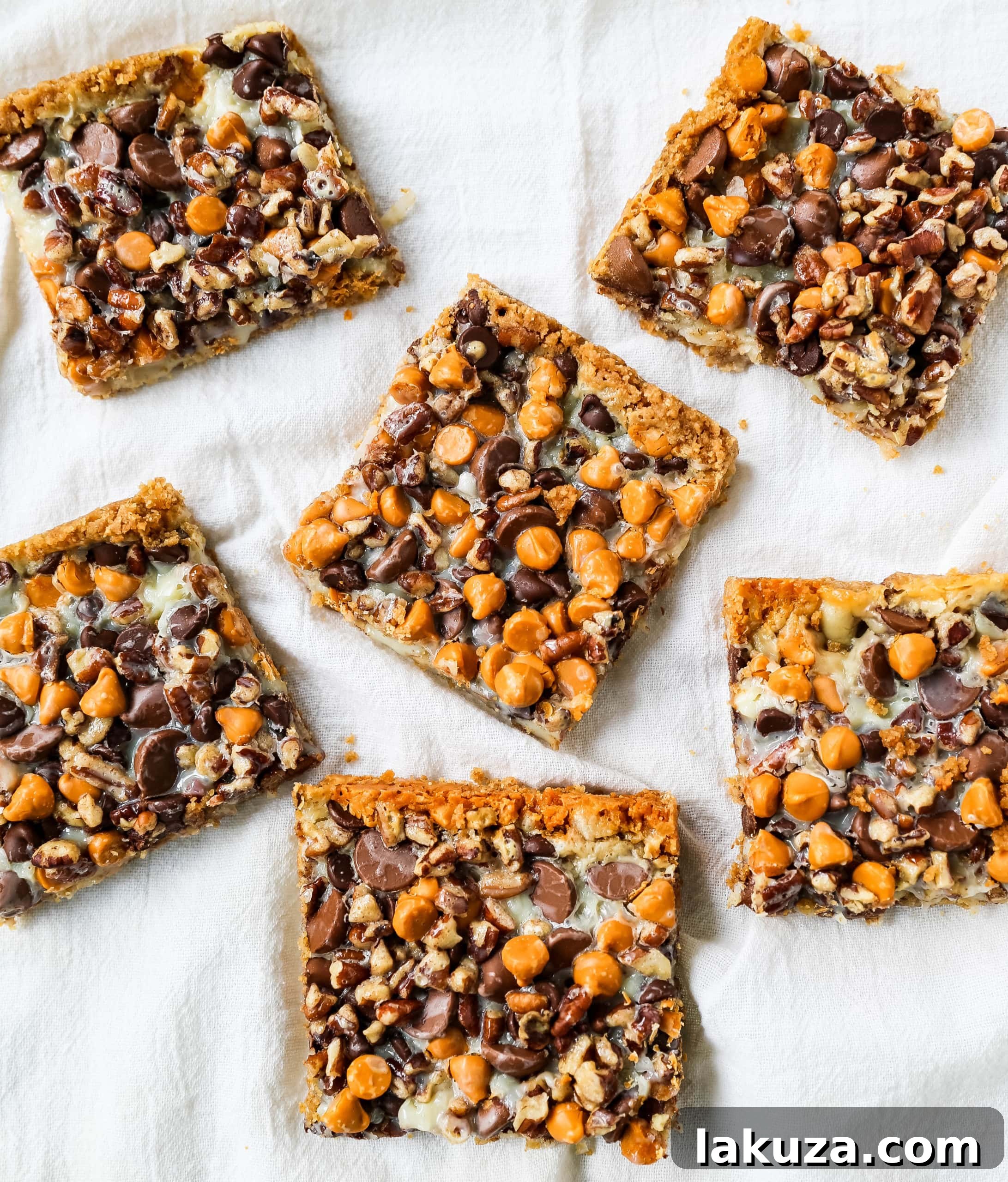 Decadent Seven-Layer Dream Bars 3 Close-up of freshly baked 7-Layer Magic Bars, highlighting the golden-brown crust and melted, gooey toppings.