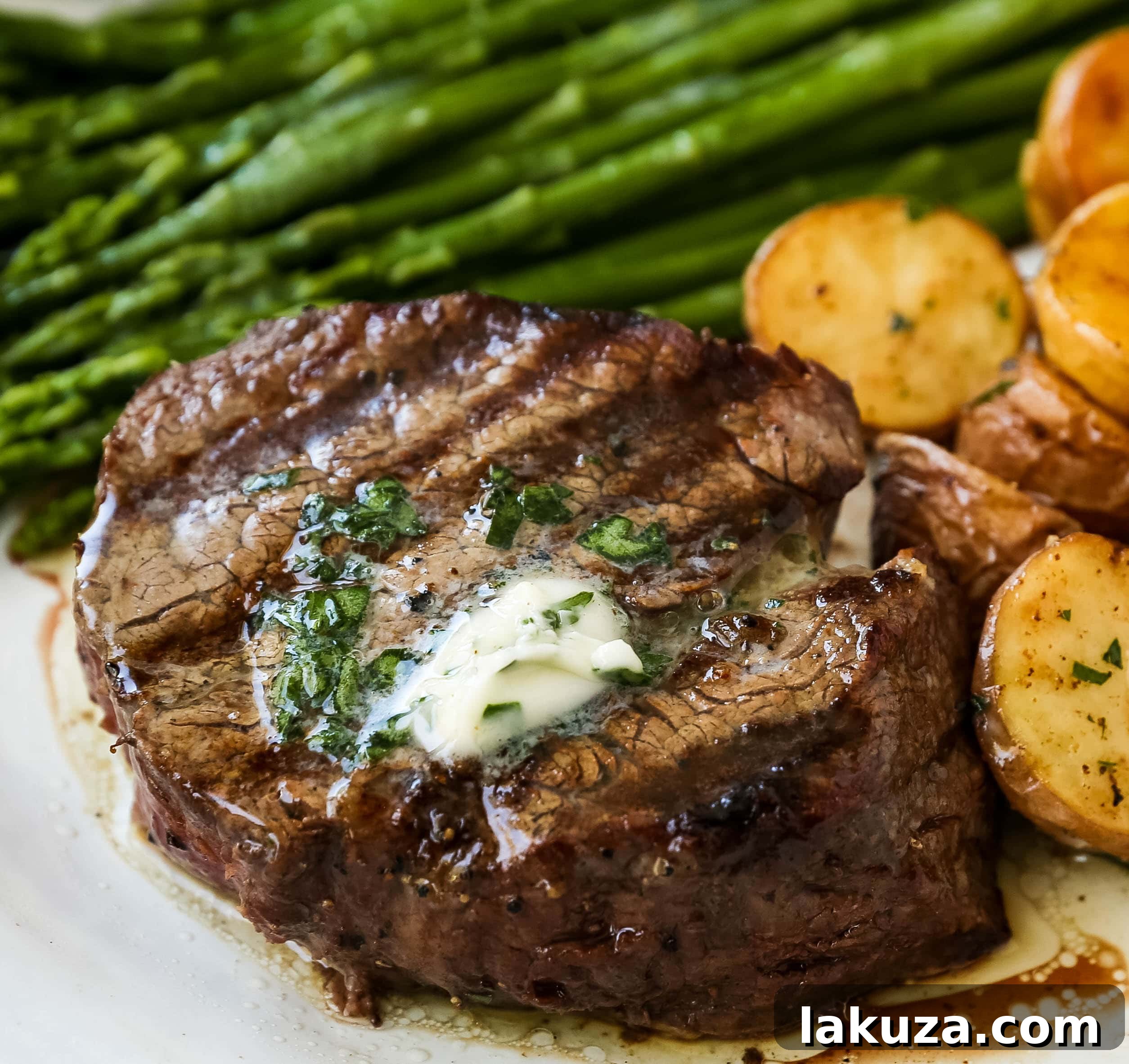 Mastering the Art of Grilled Steak 5 Grilled steak topped with melting garlic parsley butter