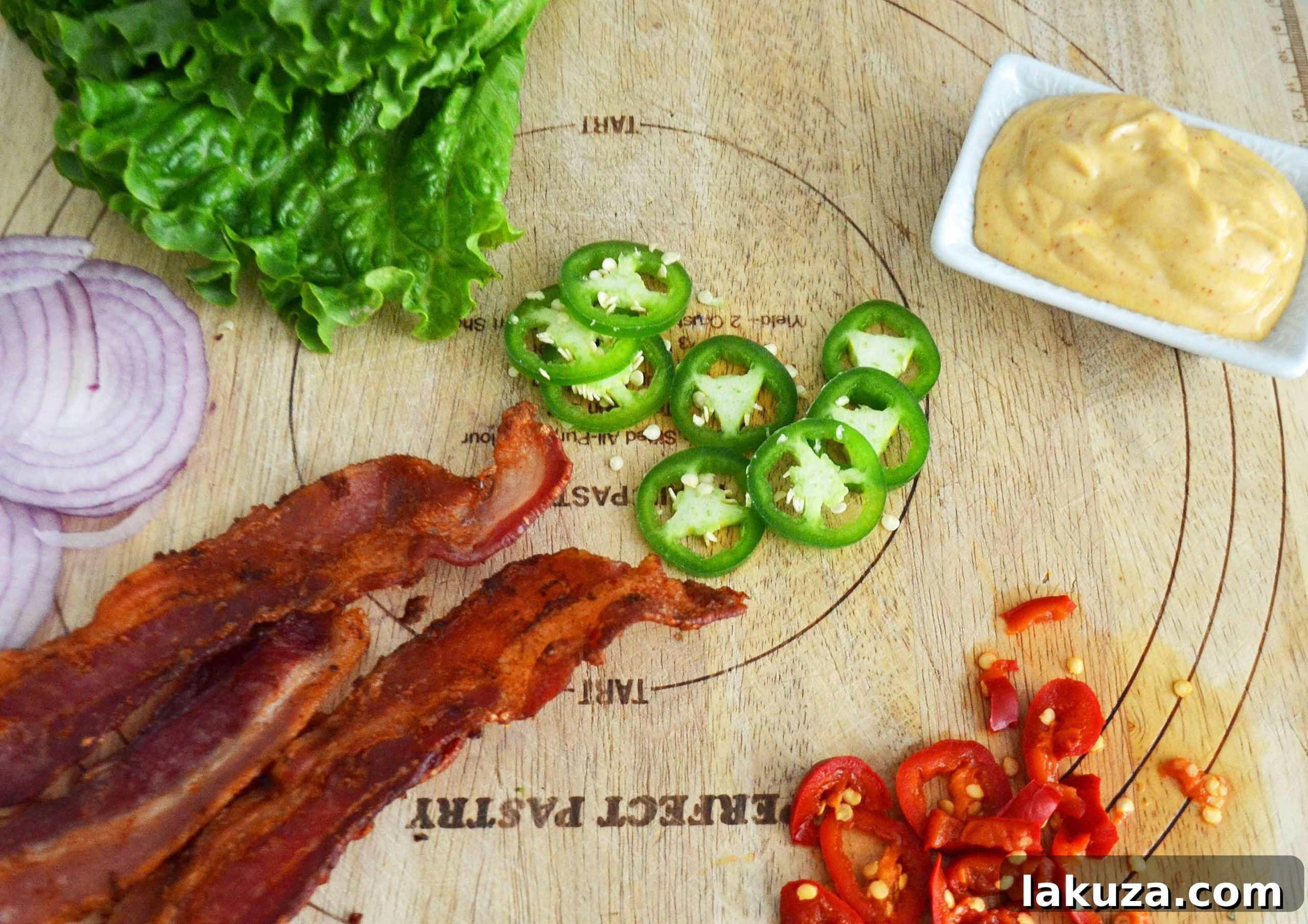 Arizona Blast Burger 4 Assortment of fresh burger toppings: ripe tomatoes, crisp lettuce, red onion, and colorful peppers
