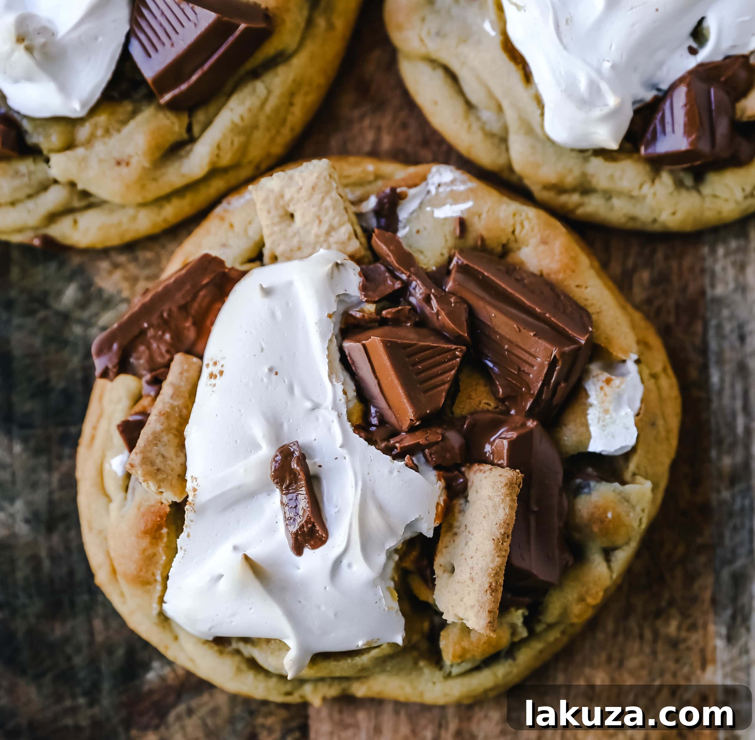 Delicious Chocolate Chip S'mores Cookies featuring gooey marshmallow, rich milk chocolate, and crisp graham crackers. A perfect blend of campfire flavors in a homemade cookie.
