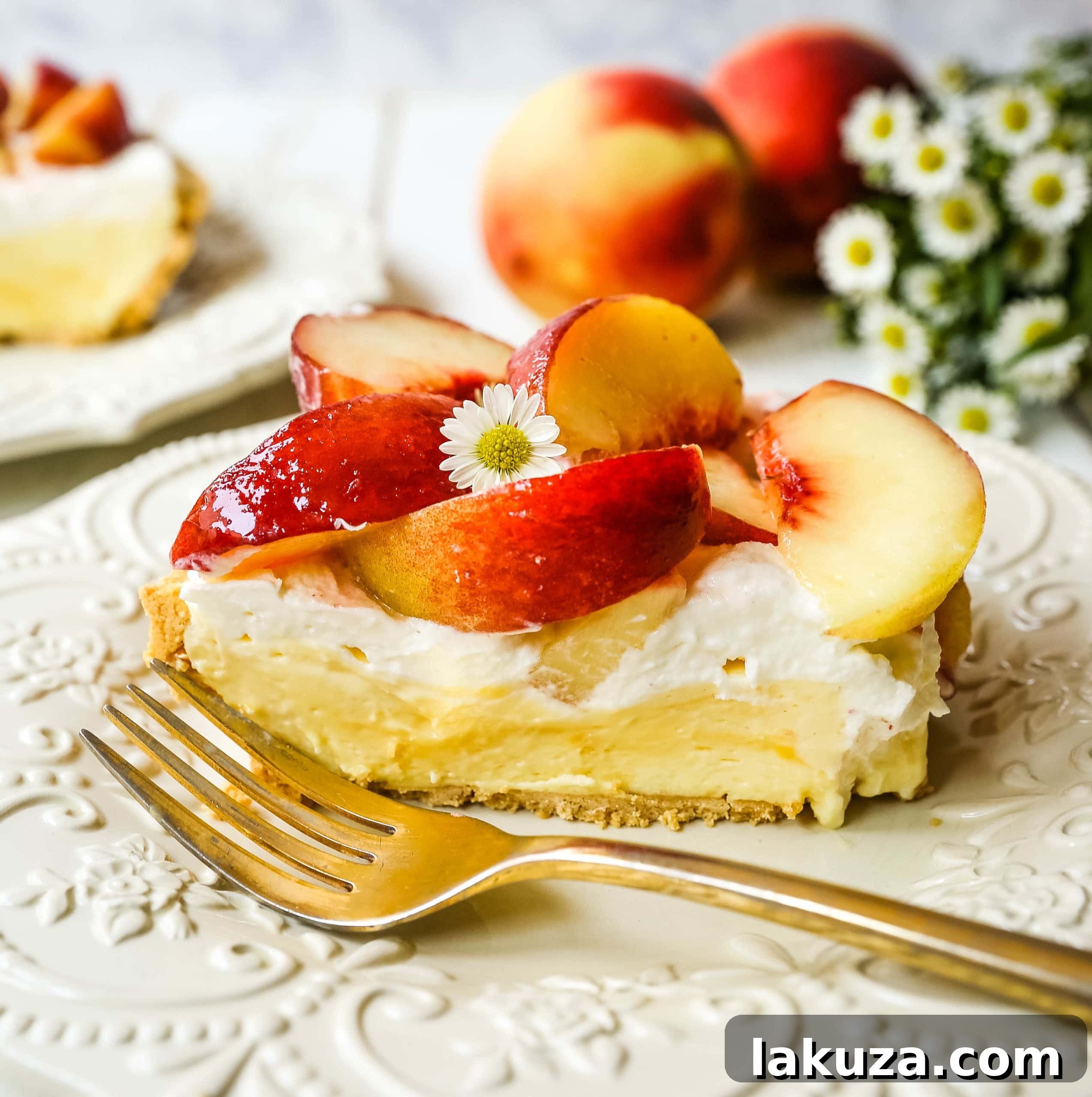 Close-up of freshly sliced peaches, sprinkled with sugar and ready to be placed on top of the creamy pie.