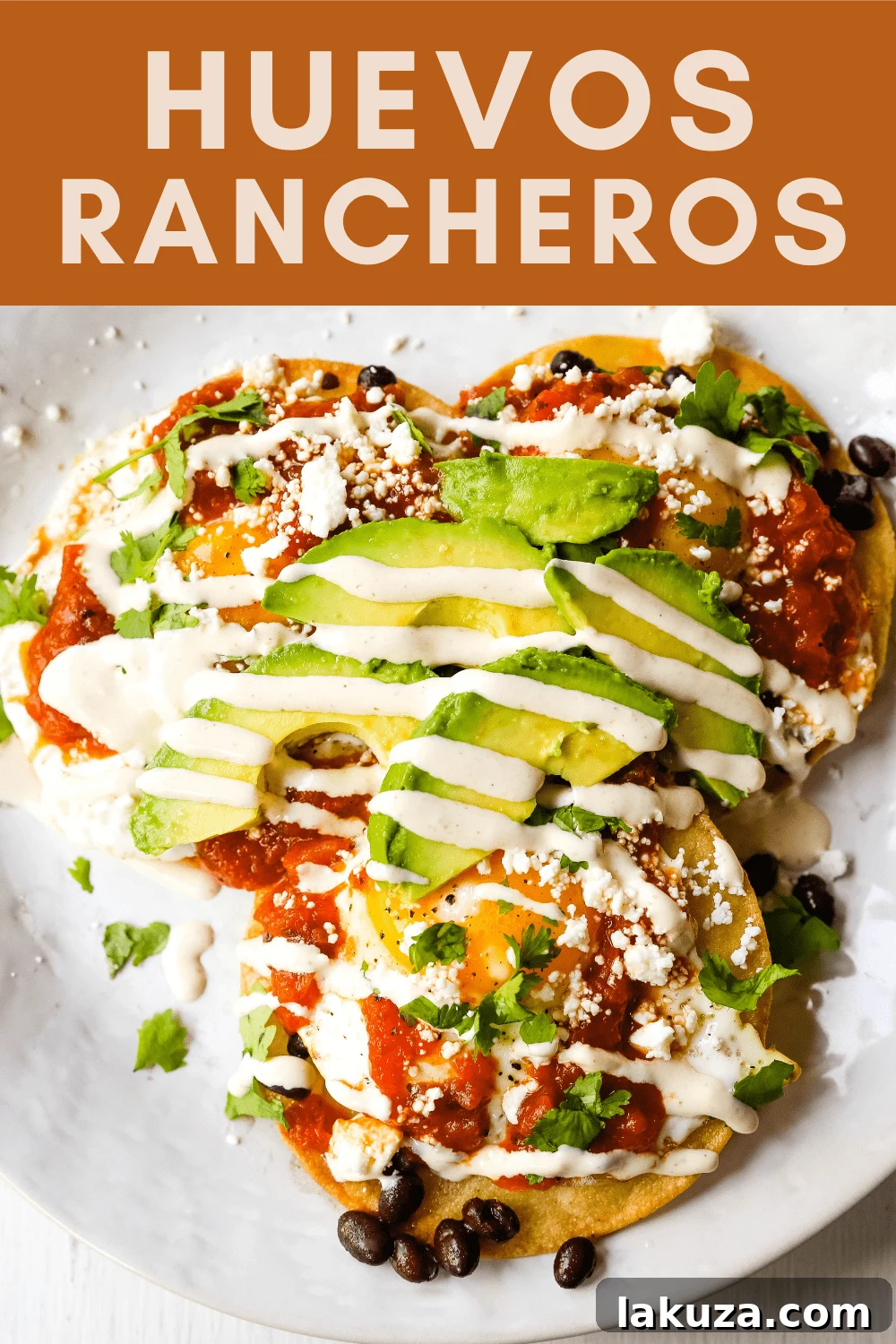 Mexican Ranch Eggs 5 A close-up, appetizing image of Huevos Rancheros, featuring a stack of fried corn tortillas, each topped with a fried egg, rich red ranchera salsa, and fresh green avocado slices. The dish is garnished with crumbled white cheese and chopped cilantro, highlighting the vibrant colors and diverse textures. The focus is sharp on the toppings, inviting viewers to savor this classic Mexican breakfast or brunch dish.