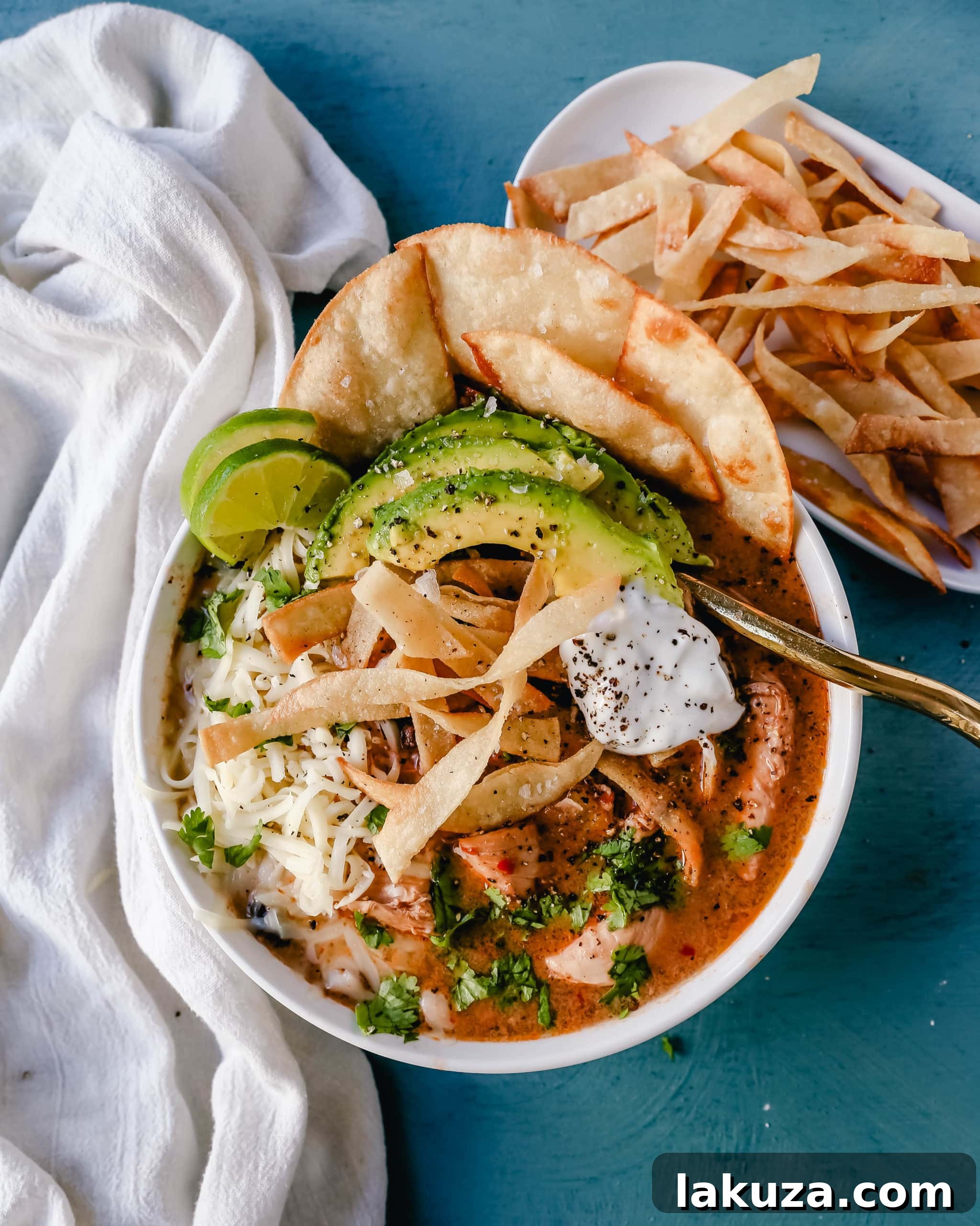 Creamy Slow Cooker Chicken Tortilla Soup 2 Rich and creamy slow cooker chicken tortilla soup, perfect for a cozy meal.