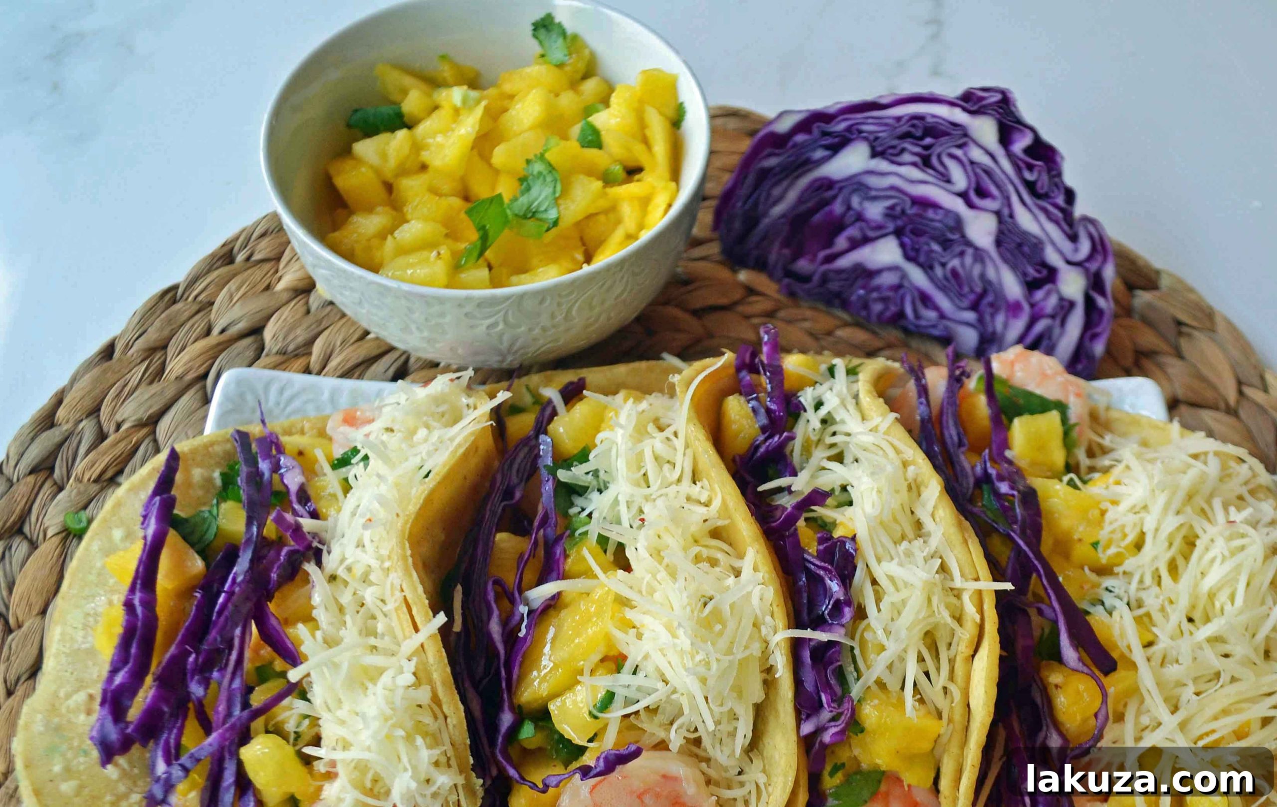 Tropical Honey Lime Shrimp Tacos with Pineapple Salsa 3 Grilled Honey Lime Shrimp Tacos ready to be served