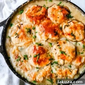 Easy Skillet Chicken Pot Pie with flaky puff pastry and creamy filling.