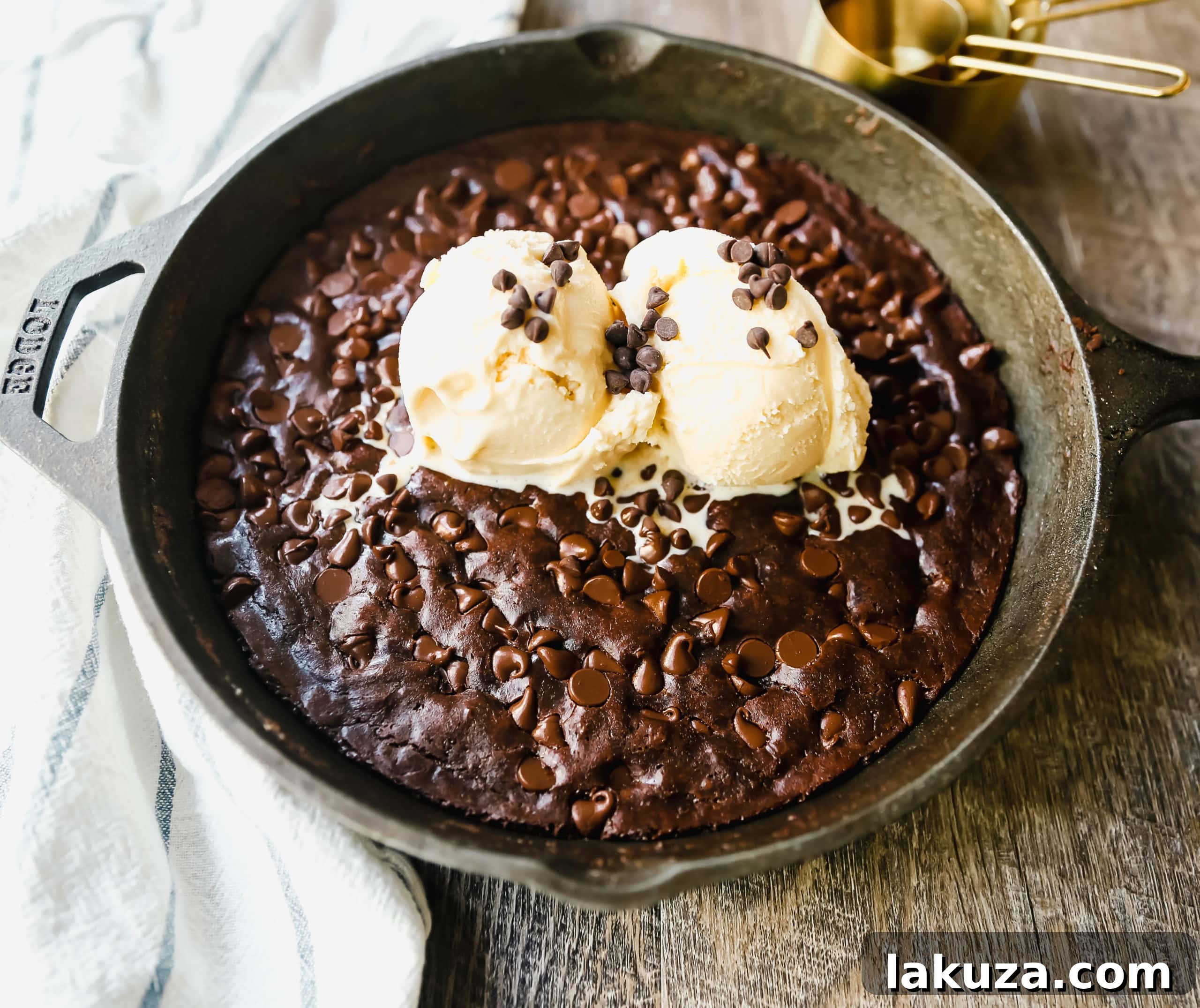 Double Chocolate Chip Skillet Cookie batter in a cast-iron skillet before baking, ready for the oven.