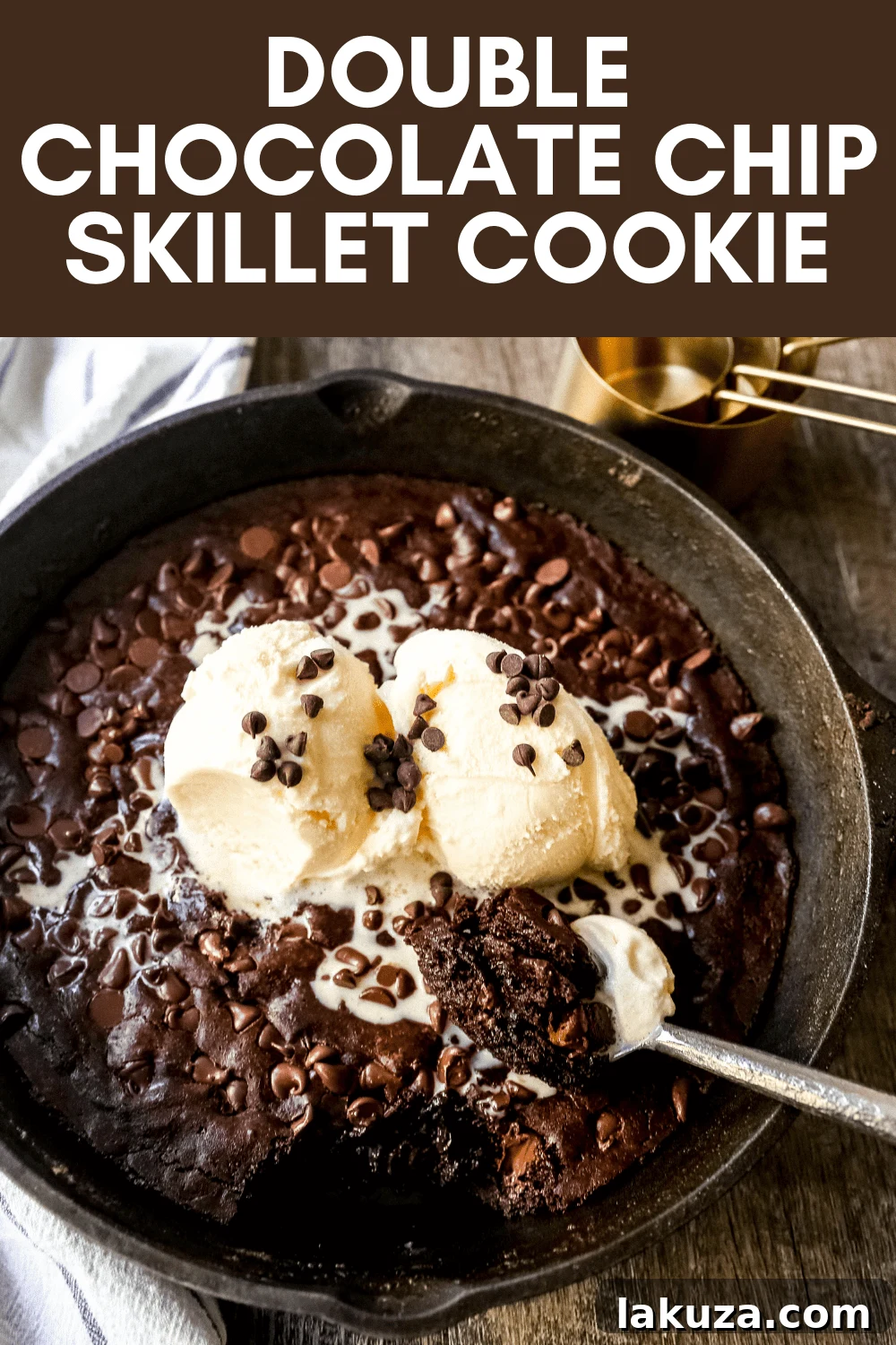 Full Double Chocolate Chip Skillet Cookie with melted ice cream and toppings, served in the cast iron pan.