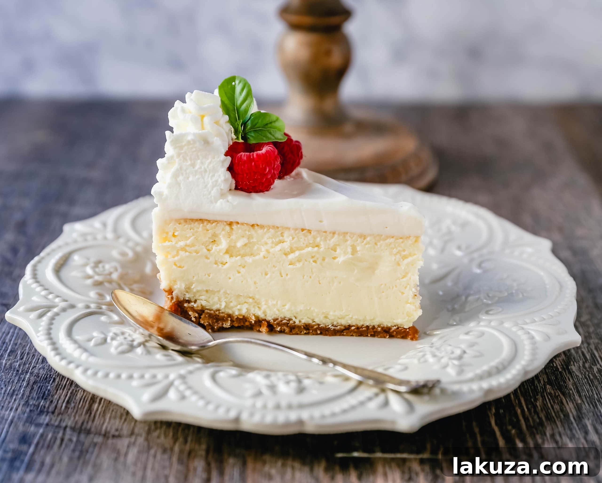 Vanilla Bean Cheesecake 5 The Best Cheesecake Recipe: How to make the creamiest, dreamiest, richest vanilla cheesecake with a buttery graham cracker crust. All of the tips and tricks for making the perfect cheesecake! www.modernhoney.com #cheesecake #vanillacheesecake #cheesecakerecipe #dessert