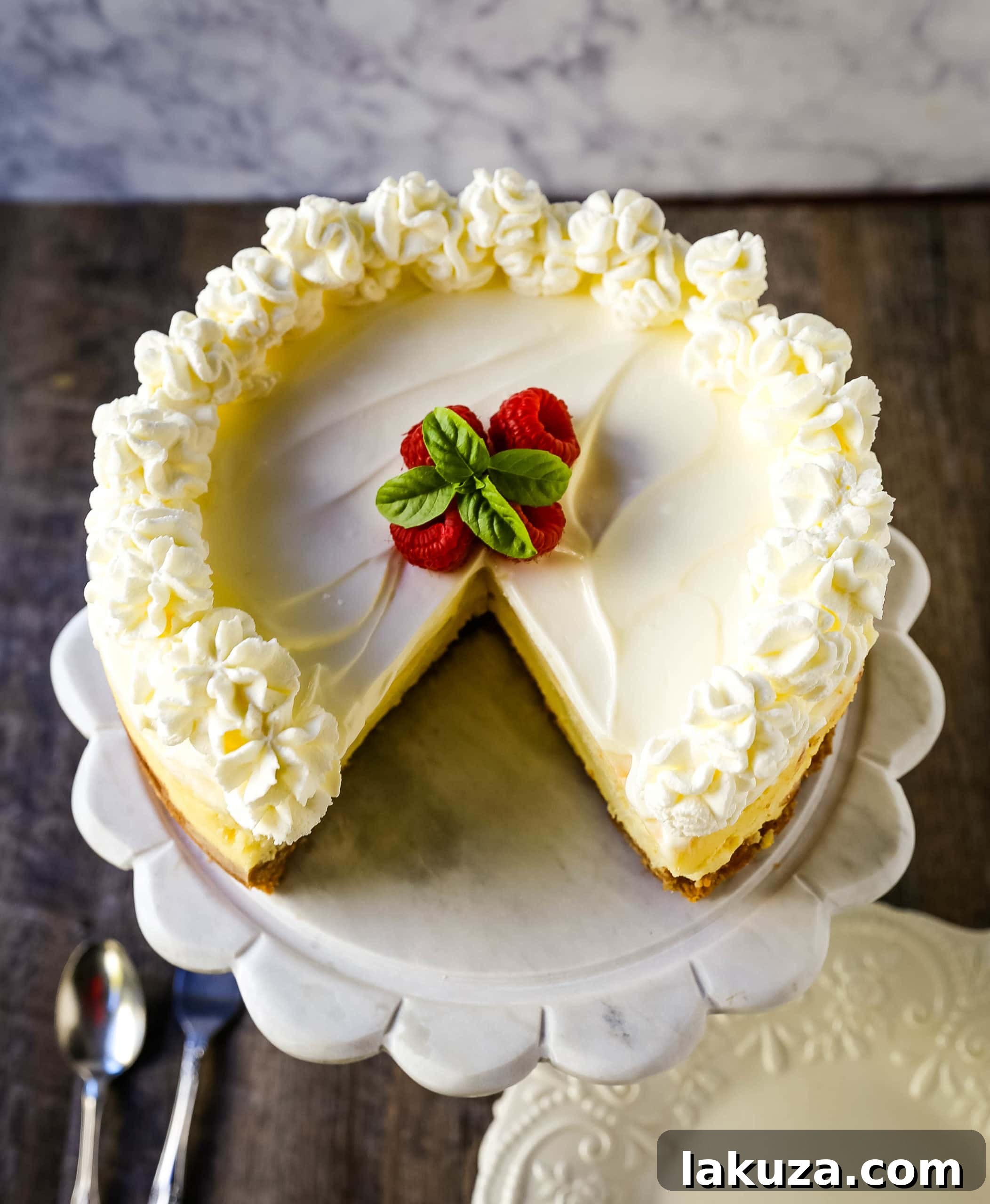 Vanilla Bean Cheesecake 6 The Best Cheesecake Recipe: How to make the creamiest, dreamiest, richest vanilla cheesecake with a buttery graham cracker crust. All of the tips and tricks for making the perfect cheesecake! www.modernhoney.com #cheesecake #vanillacheesecake #cheesecakerecipe #dessert