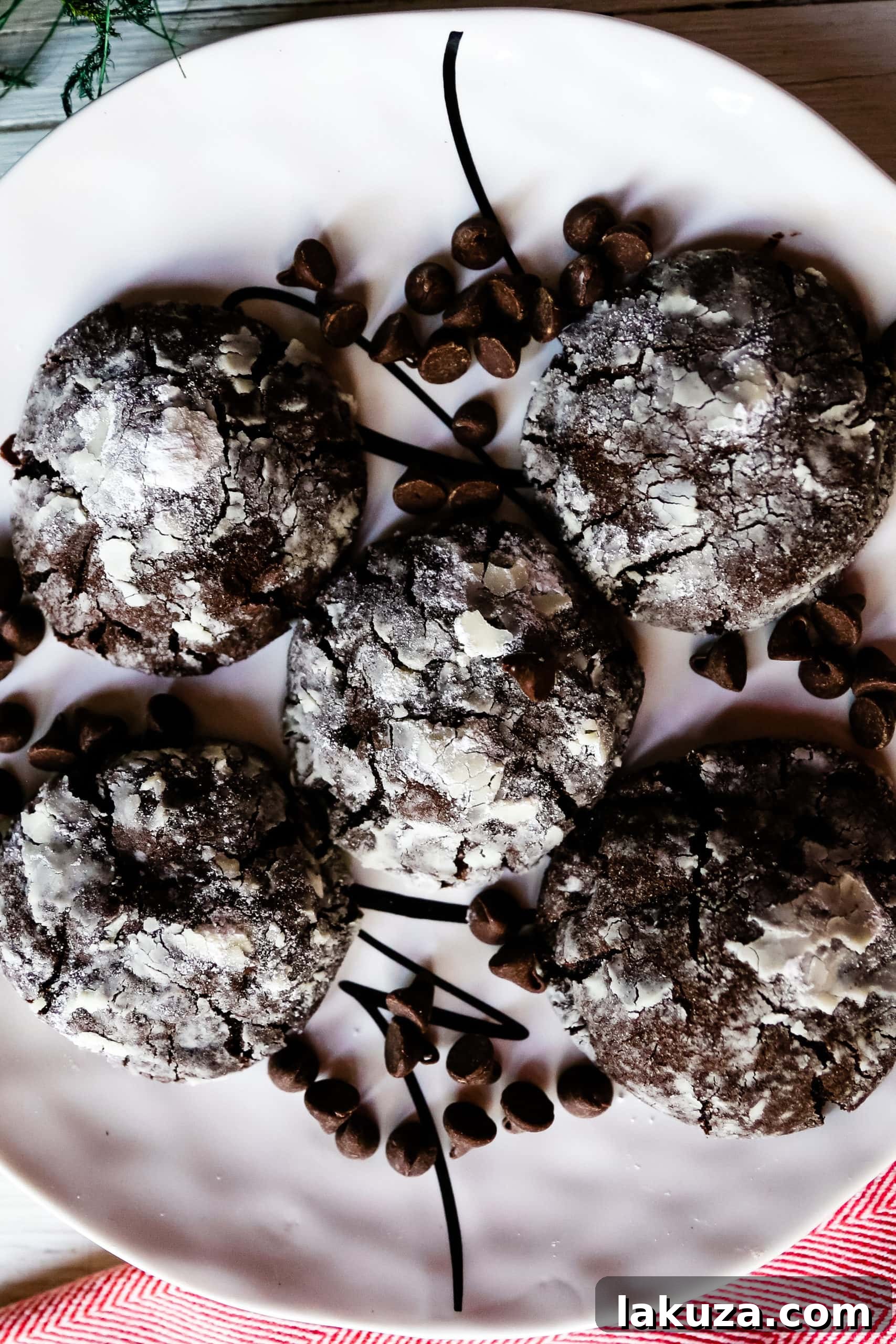 A selection of warm Chocolate Crinkle Cookies arranged beautifully, ready to be enjoyed as a holiday dessert.