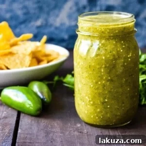 Sweet Emerald Salsa 6 Sweet Salsa Verde in a serving bowl, garnished with fresh cilantro for a vibrant presentation