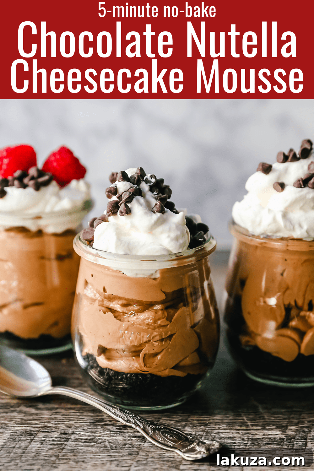 A stunning vertical shot of Chocolate Nutella Cheesecake Mousse in a stemmed glass, topped with a generous swirl of whipped cream and garnished with delicate chocolate shavings. This easy, no-bake, 5-minute dessert is made with Nutella, cream cheese, heavy cream, and powdered sugar. #nutelladessert #chocolatemousse #nobake #quickdessert