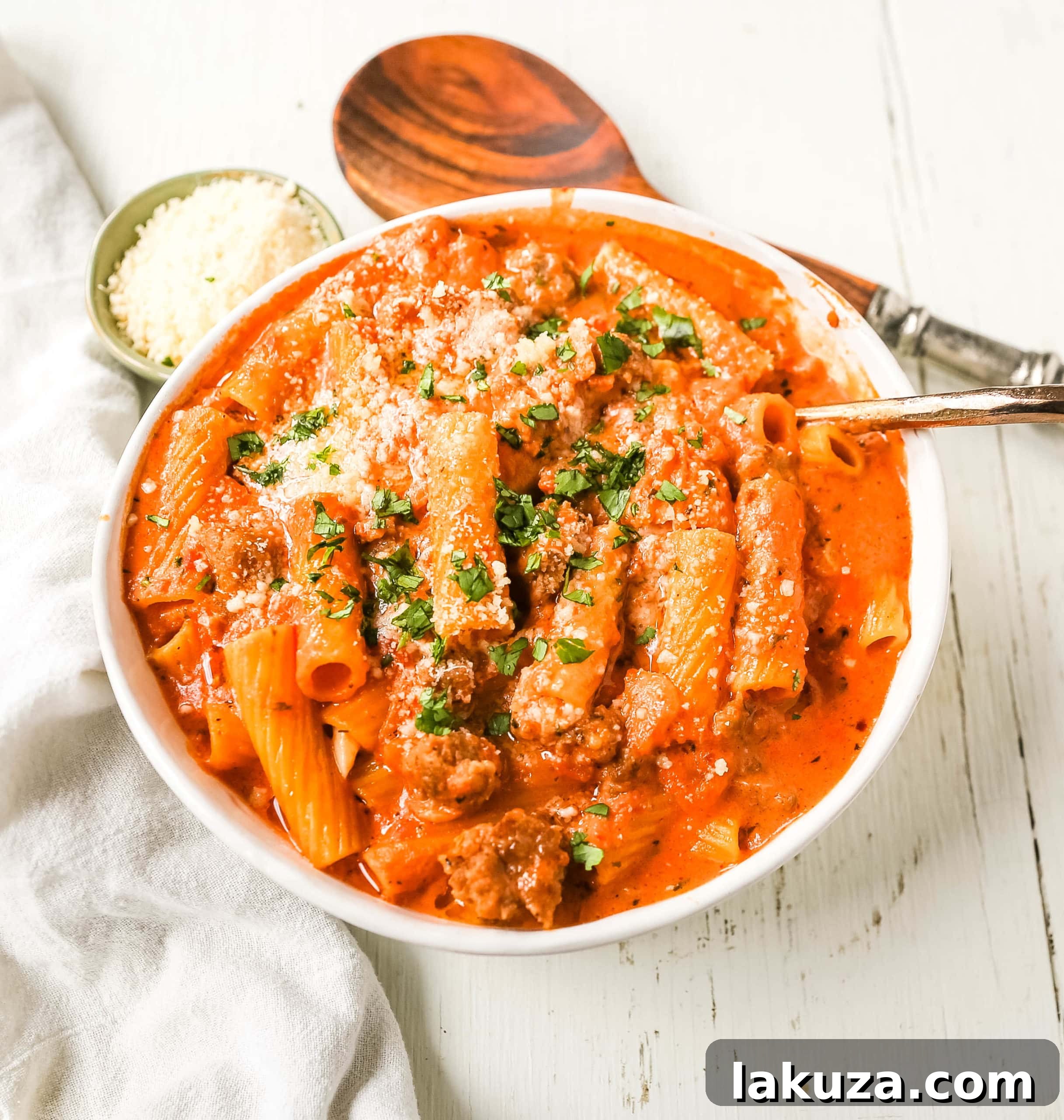 Delicious Creamy Sausage Rigatoni Pasta, perfect for a cozy dinner or special occasion. Rich tomato cream sauce with savory Italian sausage and rigatoni.