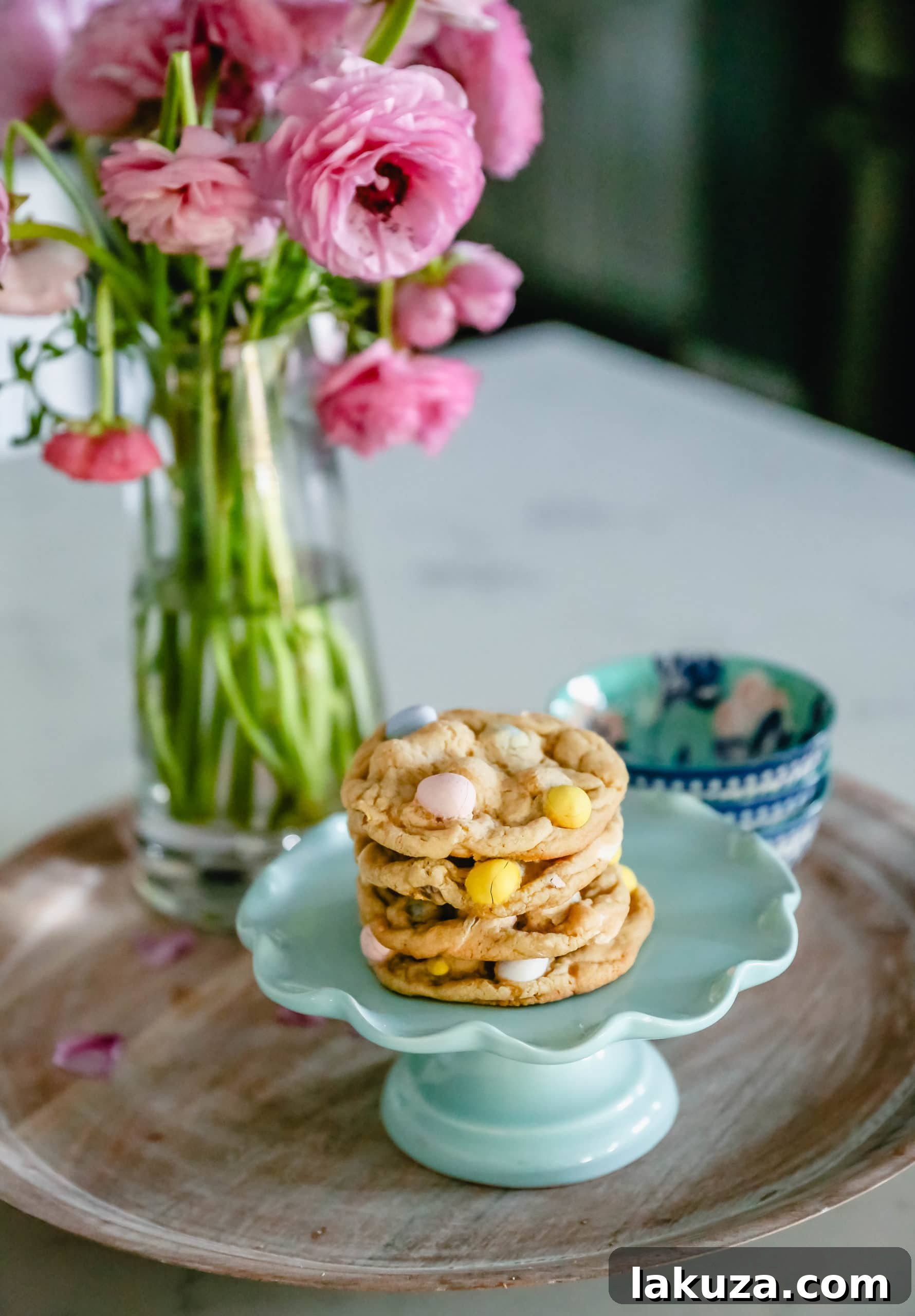 Chocolate Cadbury Egg Cookies - A white chocolate chip and famous chocolate mini Cadbury eggs cookie. Soft and chewy centers with crispy edges and decadent mini Cadbury eggs. A perfect Easter cookie! www.modernhoney.com #cookie #cookies #eastercookie #cadburyeggs