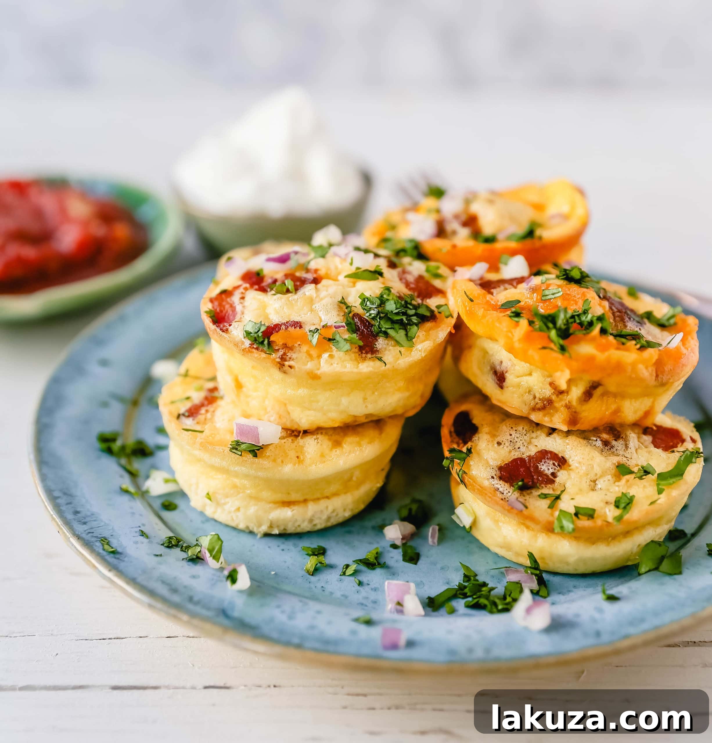 Bacon and Egg Poppers 2 Delicious Mini Egg Bacon and Cheese Bites on a platter
