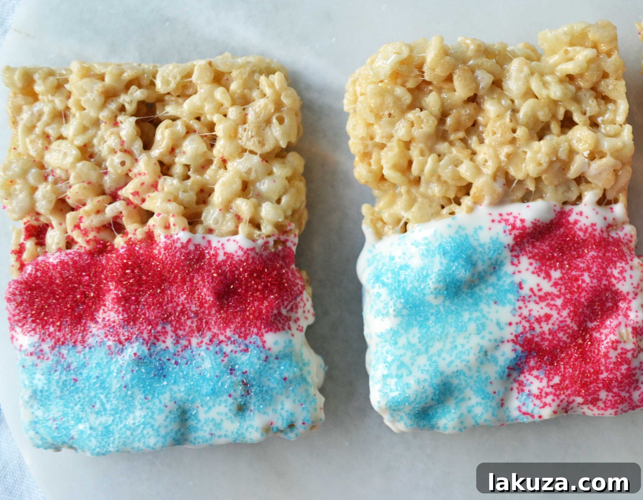 Irresistible Chocolate Coated Krispie Bars 6 Patriotic Chocolate Dipped Rice Krispies Treats for the 4th of July, featuring red, white, and blue sprinkles and decorations.