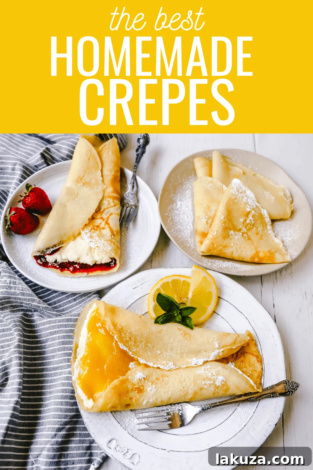 A warm, thin crepe folded and topped with powdered sugar and a sprig of mint.