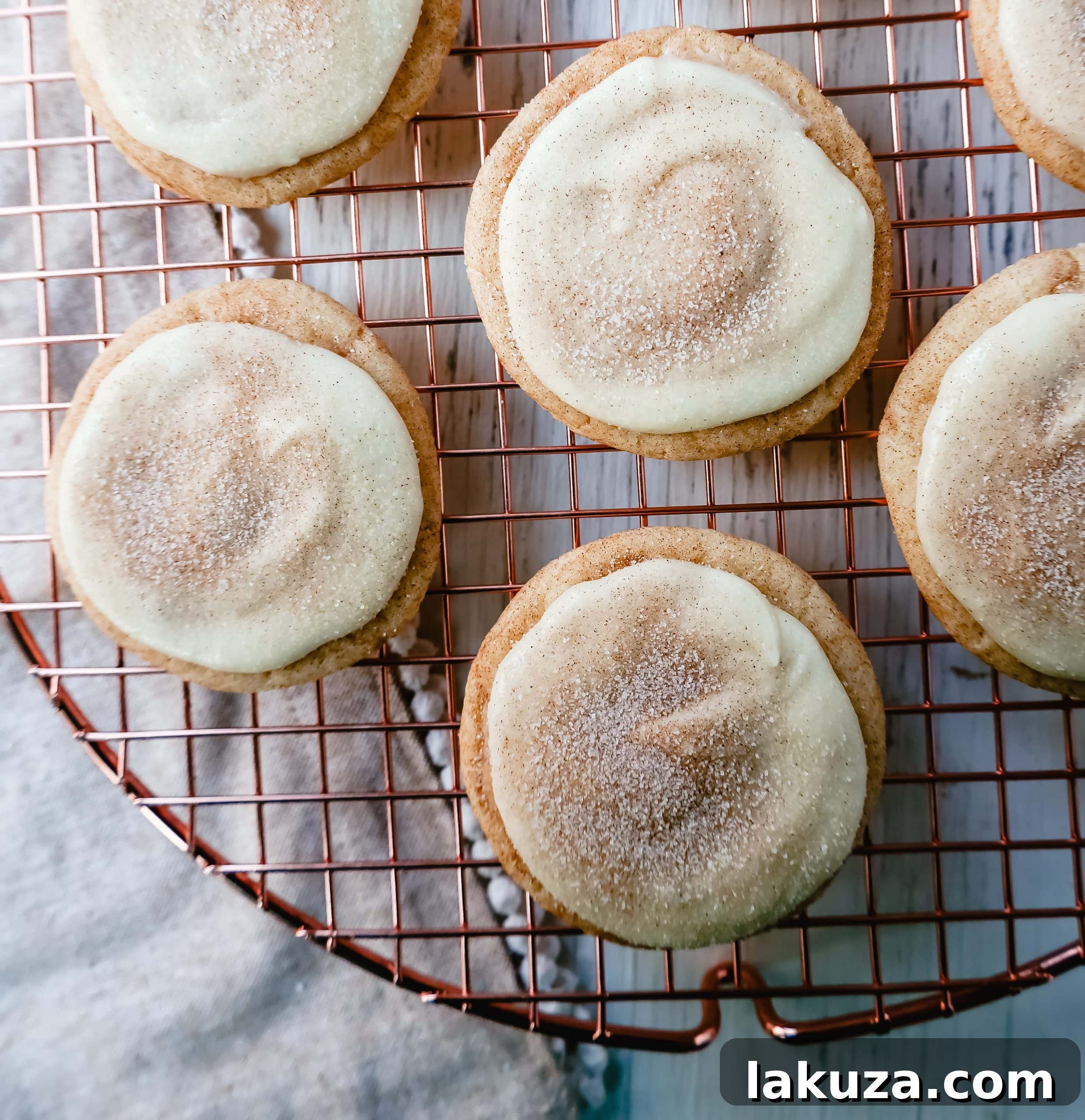 Beautifully arranged Frosted Snickerdoodle Cookies on a platter, ready to be served