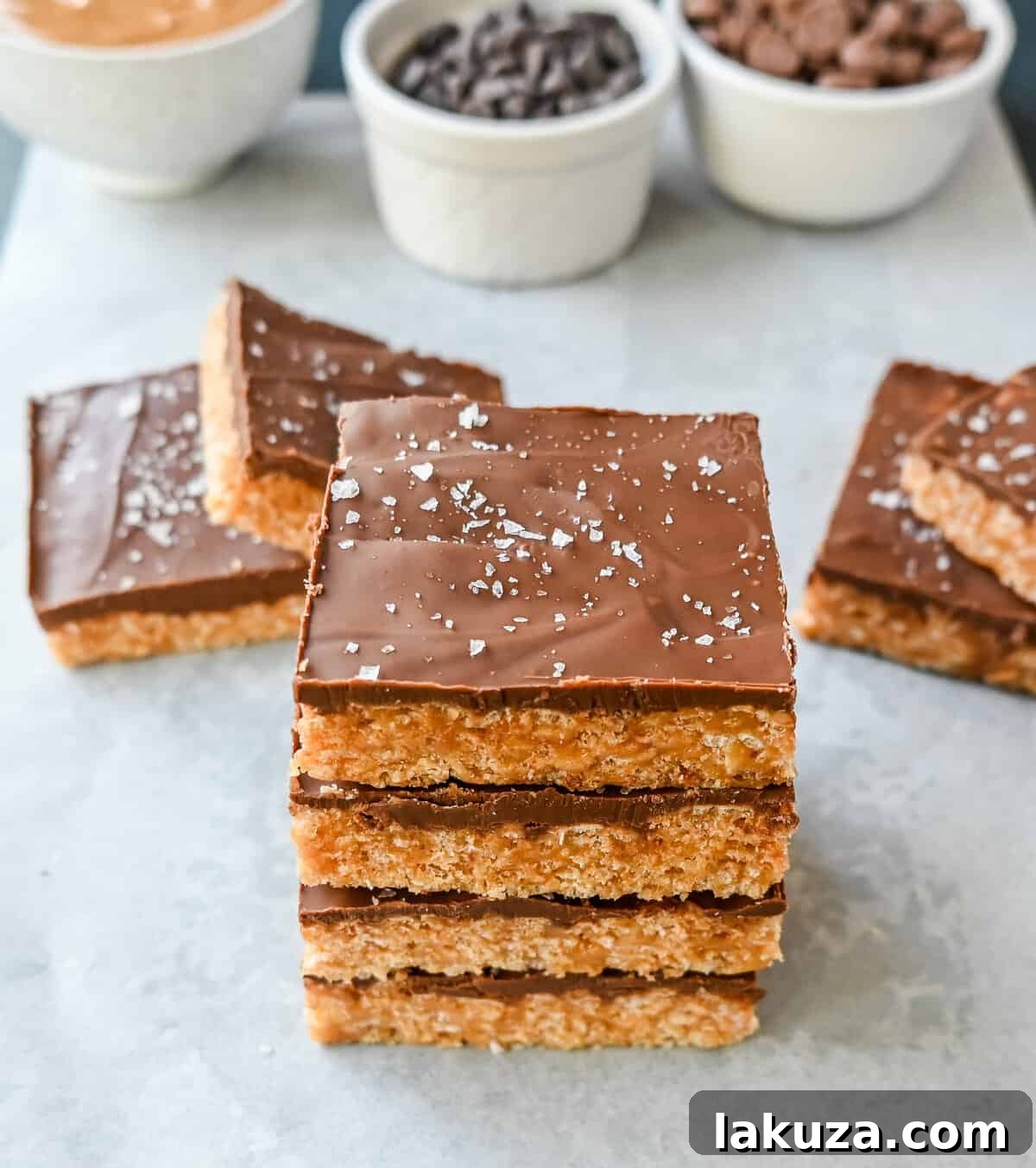 Best Scotcheroos Recipe. A popular dessert bar made with chocolate, peanut butter, butterscotch, and Rice Krispies. An easy no-bake dessert bar made in minutes! 