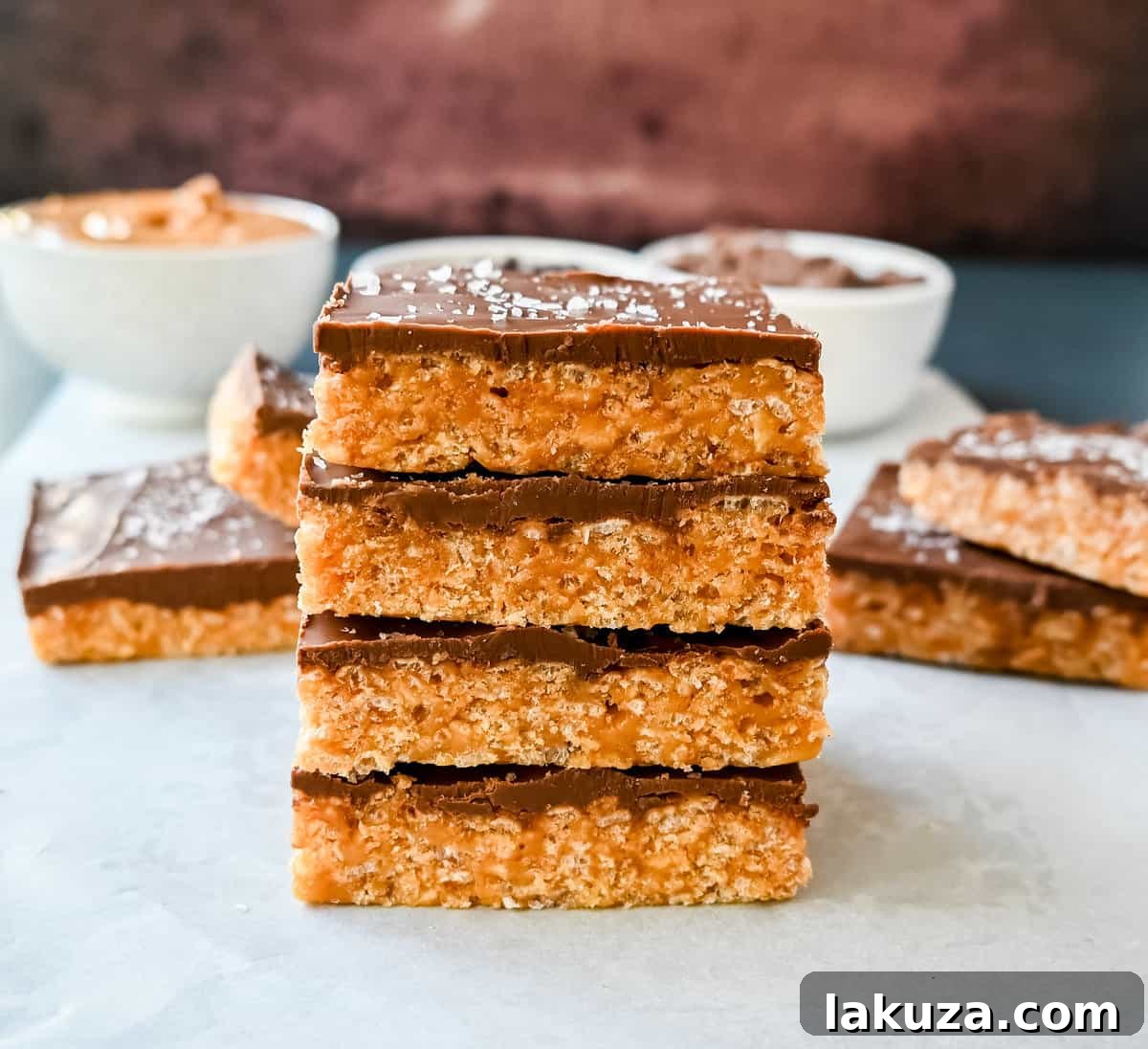 Best Scotcheroos Recipe. A popular dessert bar made with chocolate, peanut butter, butterscotch, and Rice Krispies. An easy no-bake dessert bar made in minutes! 