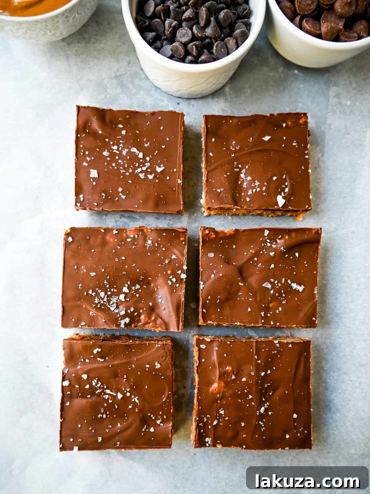 Best Scotcheroos Recipe. A popular dessert bar made with chocolate, peanut butter, butterscotch, and Rice Krispies. An easy no-bake dessert bar made in minutes! 