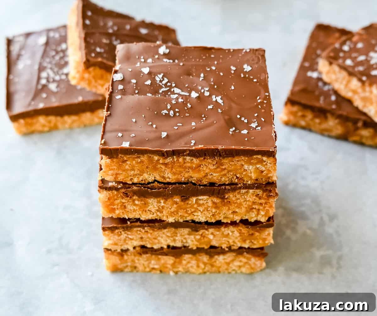 Best Scotcheroos Recipe. A popular dessert bar made with chocolate, peanut butter, butterscotch, and Rice Krispies. An easy no-bake dessert bar made in minutes! 