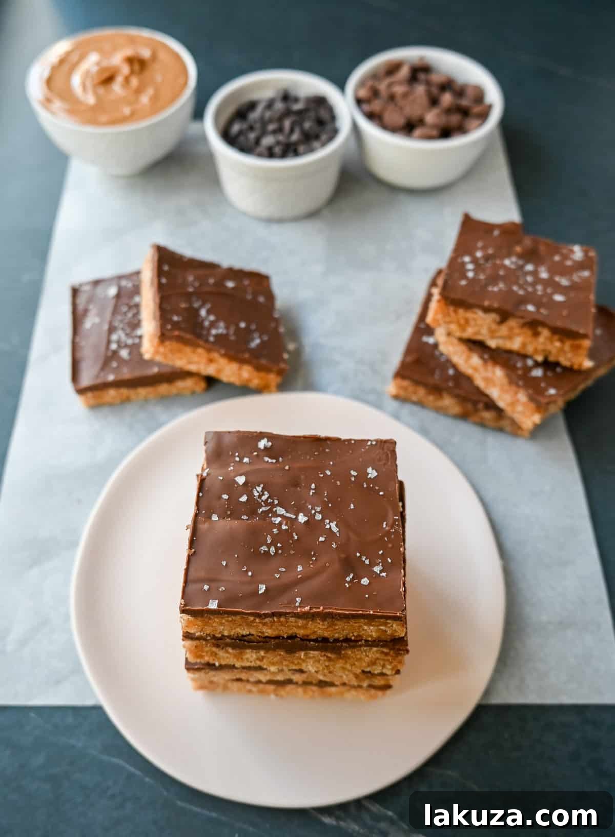 Best Scotcheroos Recipe. A popular dessert bar made with chocolate, peanut butter, butterscotch, and Rice Krispies. An easy no-bake dessert bar made in minutes! 