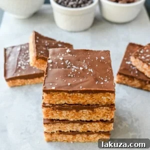 Best Scotcheroos Recipe. A popular dessert bar made with chocolate, peanut butter, butterscotch, and Rice Krispies. An easy no-bake dessert bar made in minutes!
