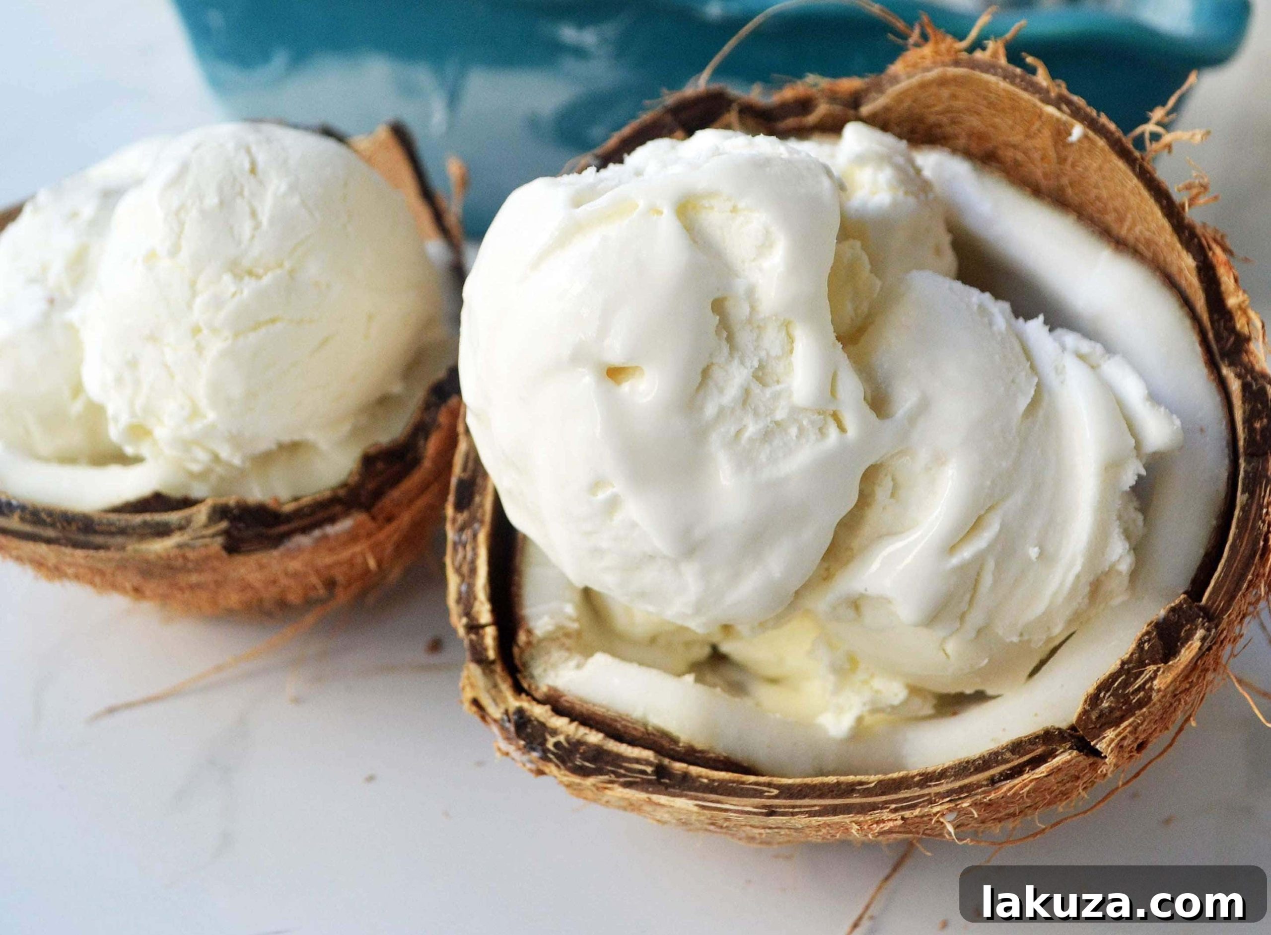 Creamy No-Churn Coconut Ice Cream with Fresh Mango Slices by Modern Honey