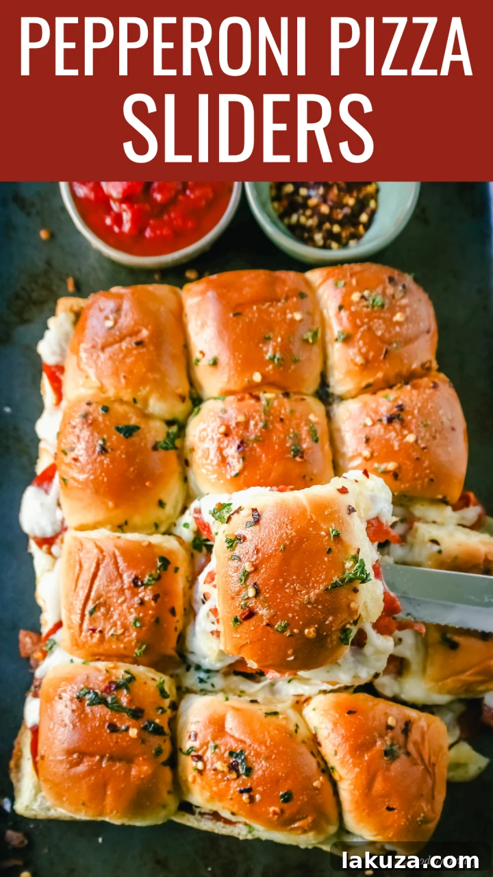 Cheesy Pepperoni Pull-Apart Buns 2 A serving platter of Pepperoni Pizza Sliders, ready for guests to enjoy at a party.