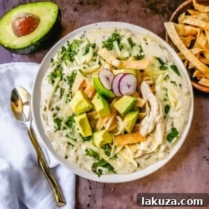 Creamy Green Chile Chicken Enchilada Soup, a perfect comfort food.