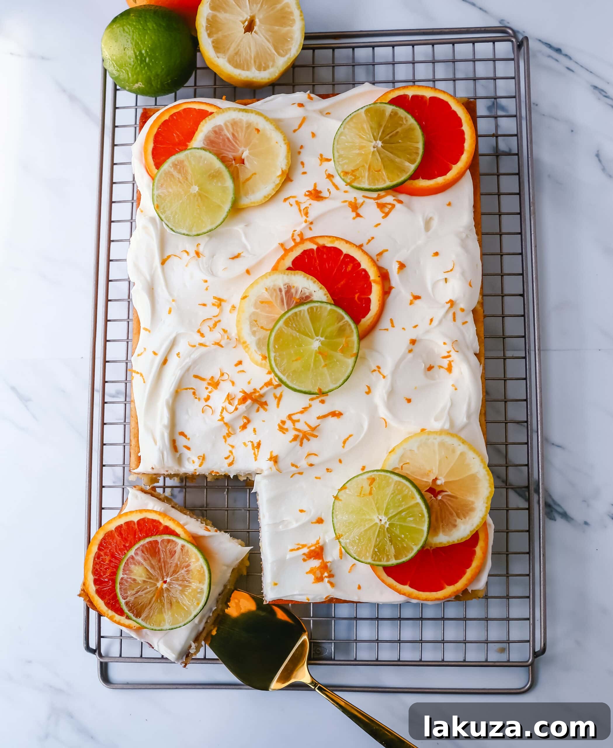 Zesty Citrus Sheet Cake 3 Citrus Sheet Cake made with fresh-squeezed orange, lemon, and lime juices in a moist, fluffy cake and topped with a creamy and silky homemade cream cheese frosting and topped with citrus slices. A beautiful Spring and Summer celebration cake!