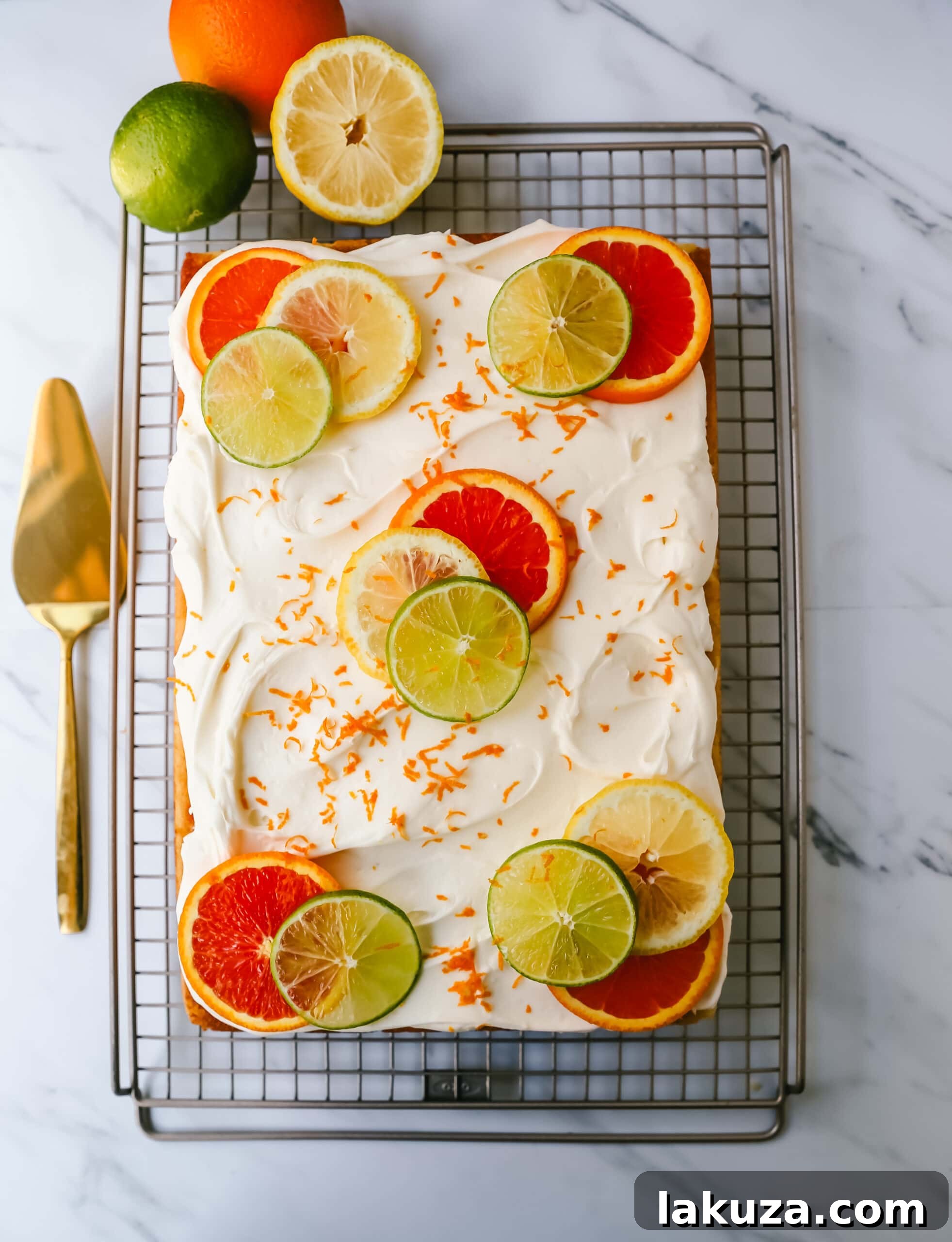 Zesty Citrus Sheet Cake 5 Citrus Sheet Cake made with fresh-squeezed orange, lemon, and lime juices in a moist, fluffy cake and topped with a creamy and silky homemade cream cheese frosting and topped with citrus slices. A beautiful Spring and Summer celebration cake!