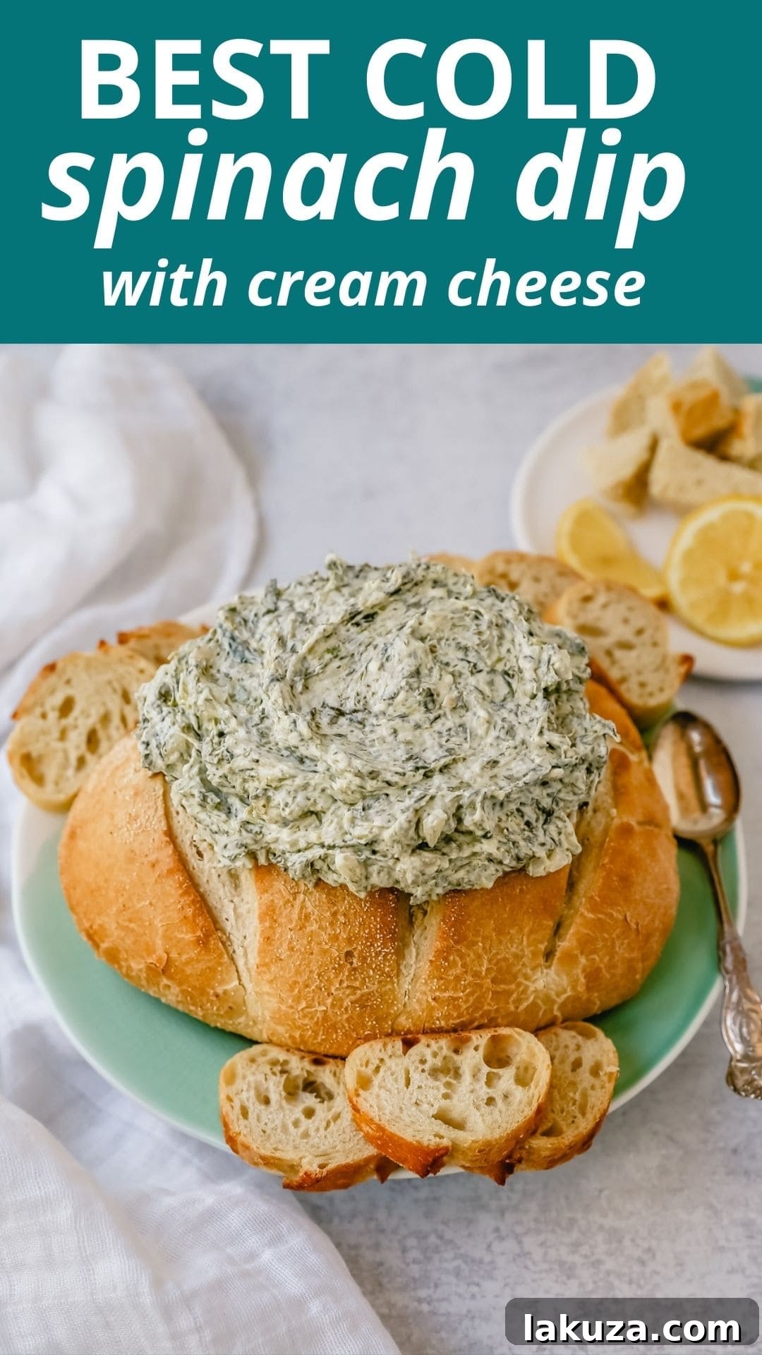 A final, close-up shot of the creamy cold spinach dip in a rustic bowl, garnished with a sprig of fresh herb, showcasing its inviting texture and readiness to be enjoyed.